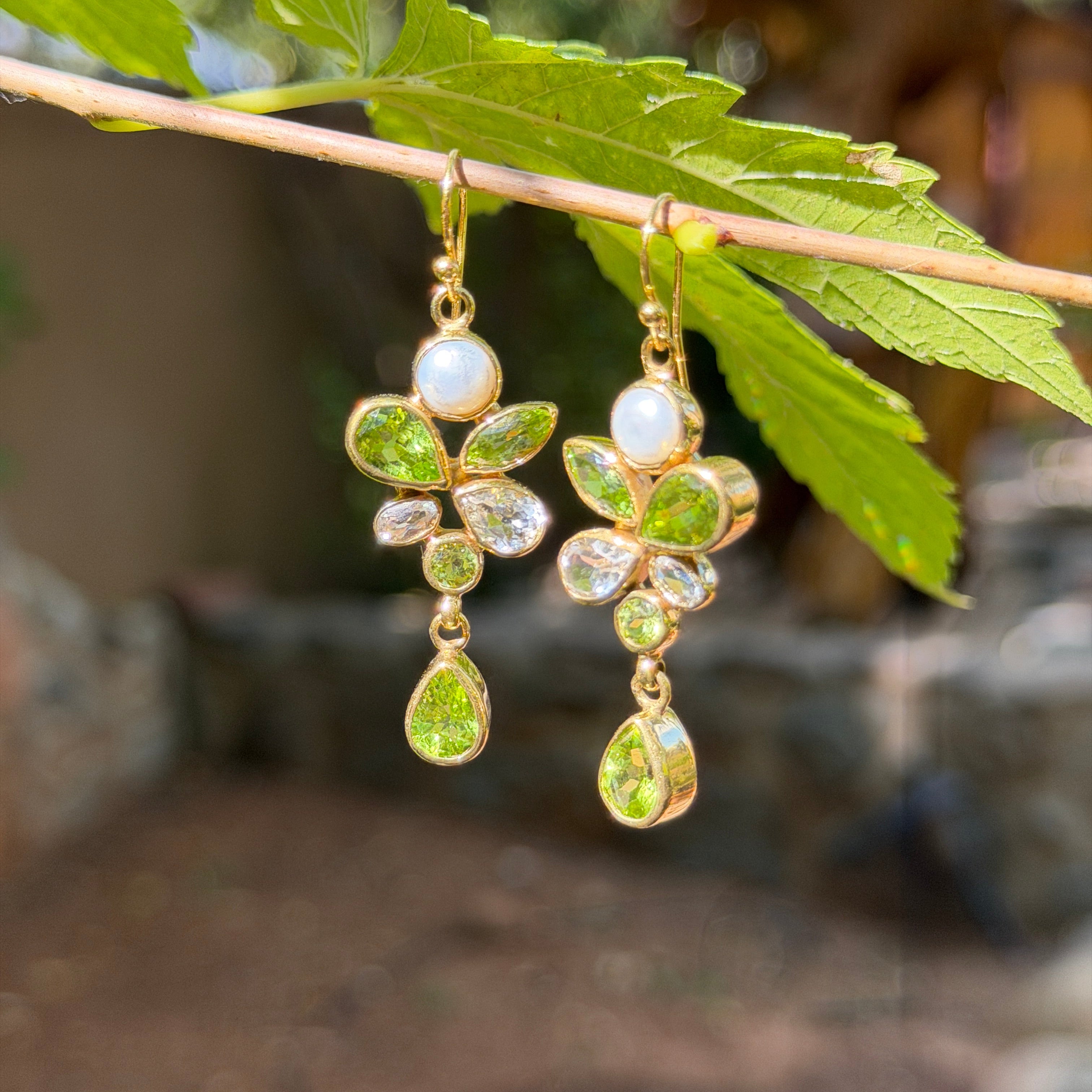 Starborn Peridot Dangle Earrings in Nordic Gold