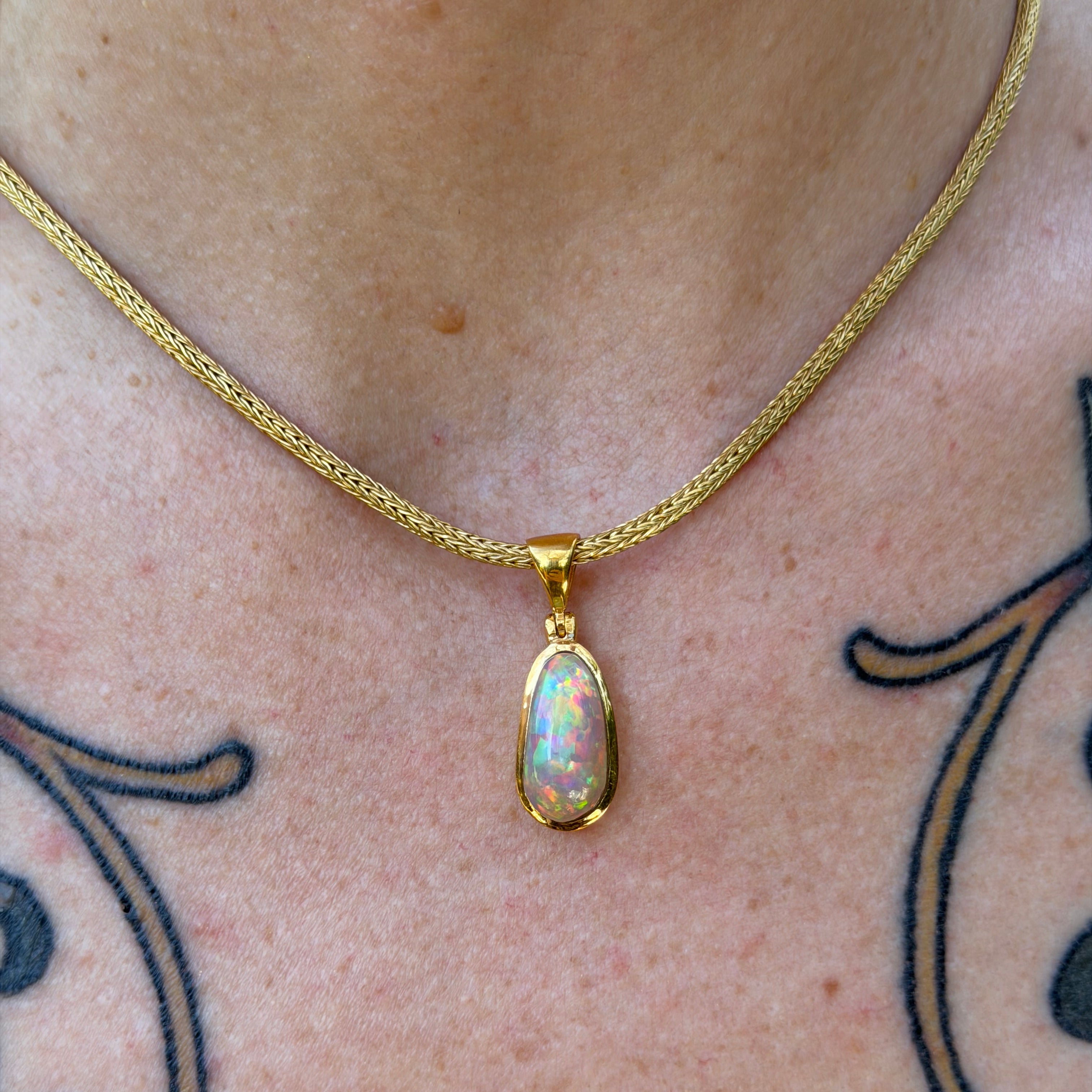 Starborn Ethiopian Opal Pendant in Gold Micron