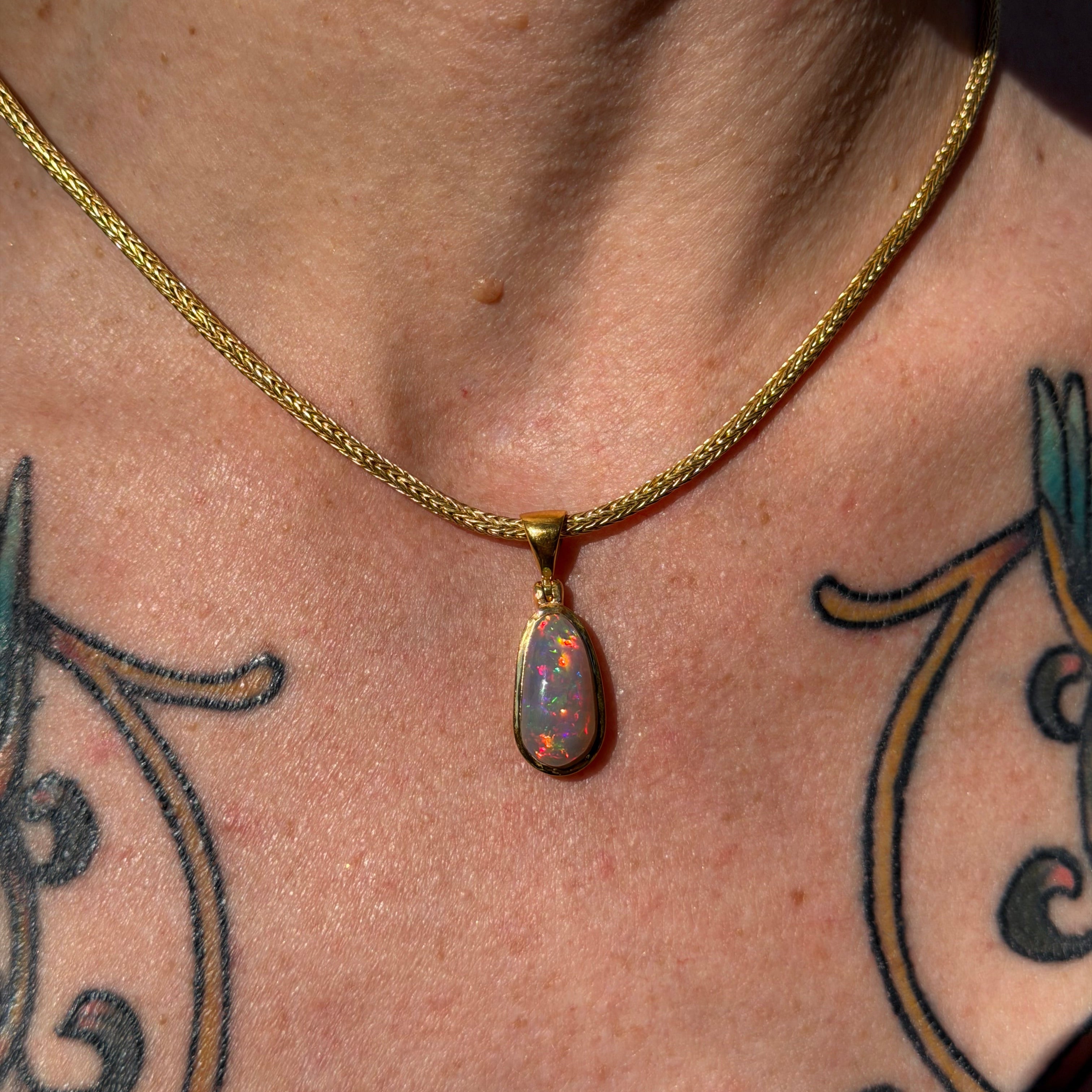 Starborn Ethiopian Opal Pendant in Gold Micron