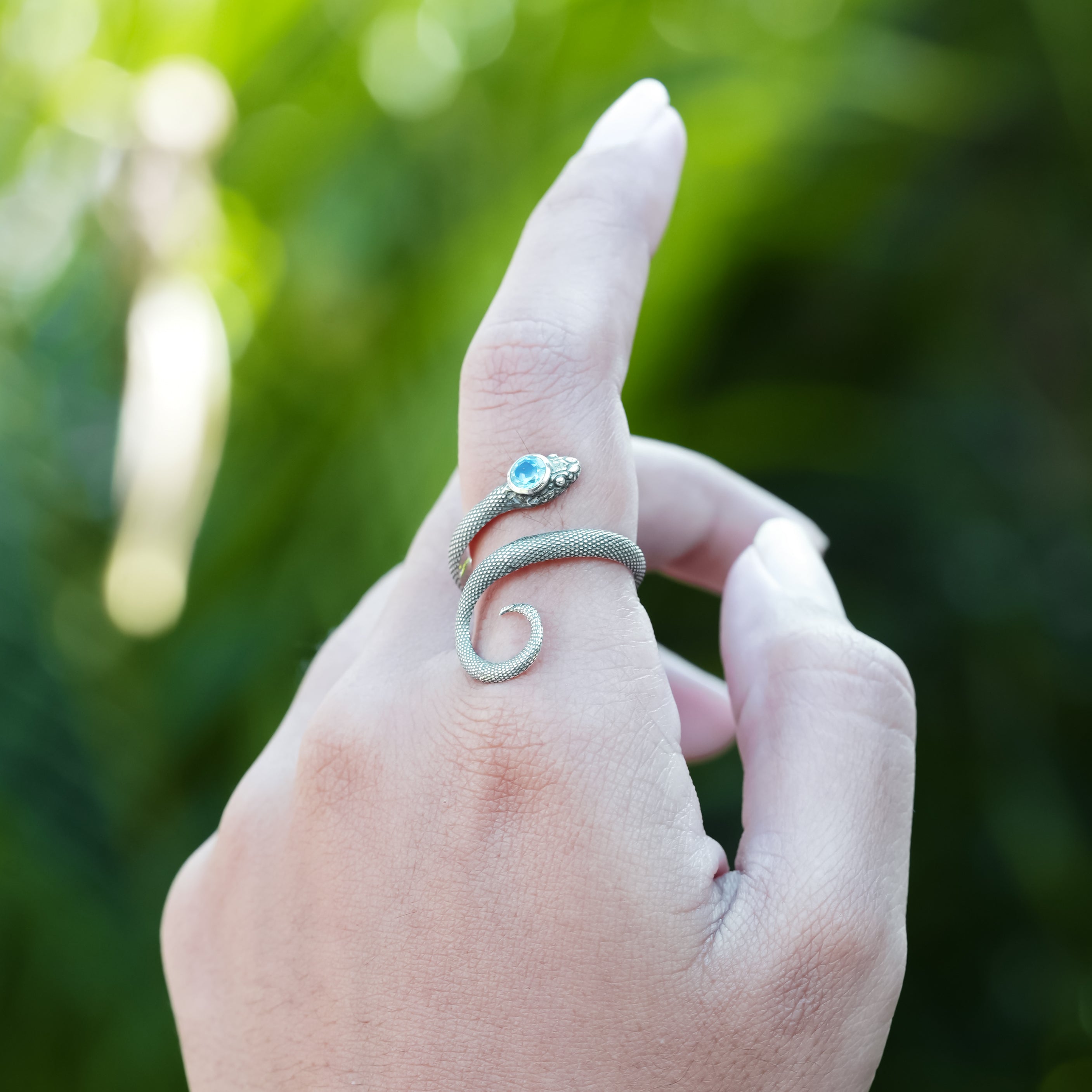 Starborn Coiled Snake Ring with Faceted Apatite in Sterling Silver