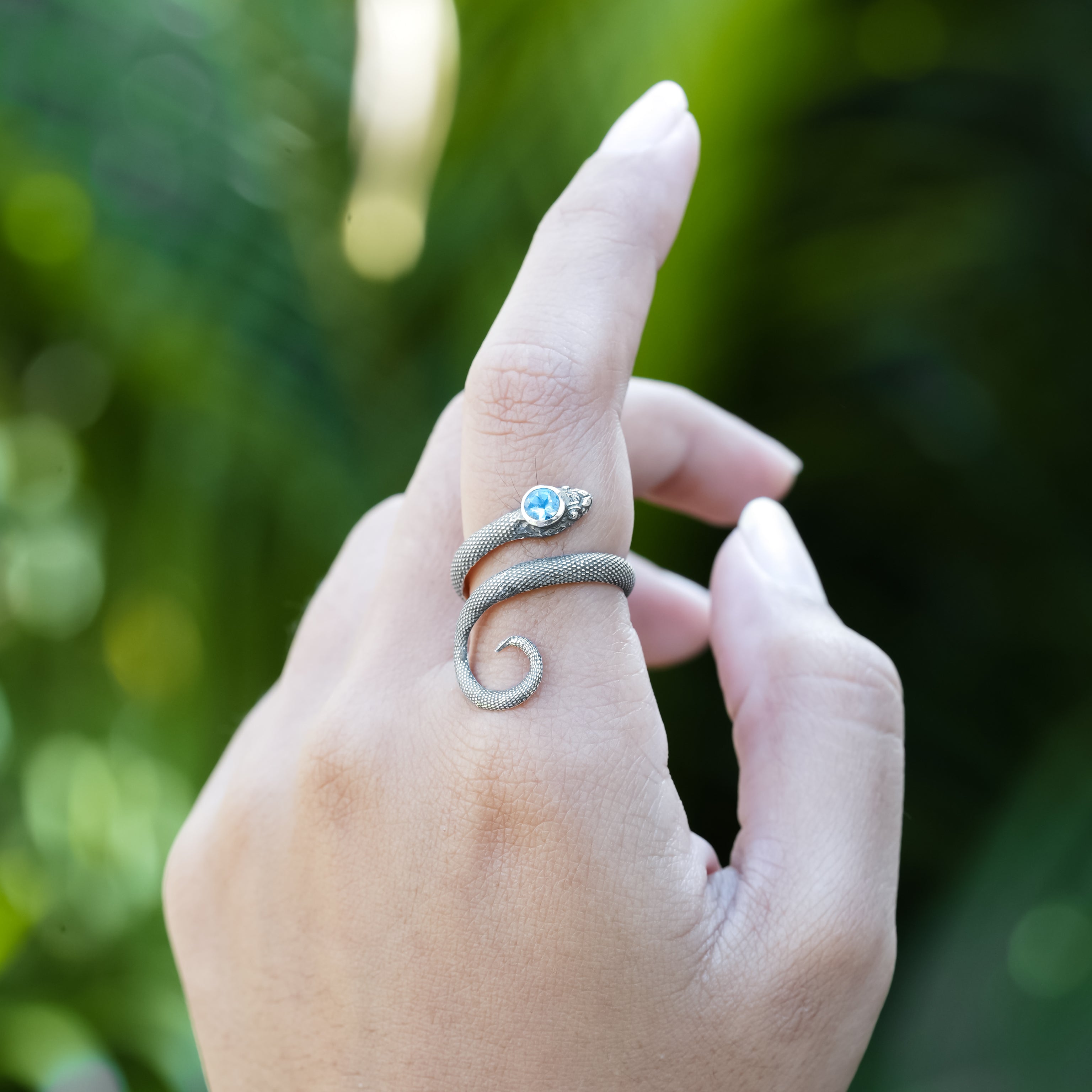 Starborn Coiled Snake Ring with Faceted Aquamarine in Sterling Silver