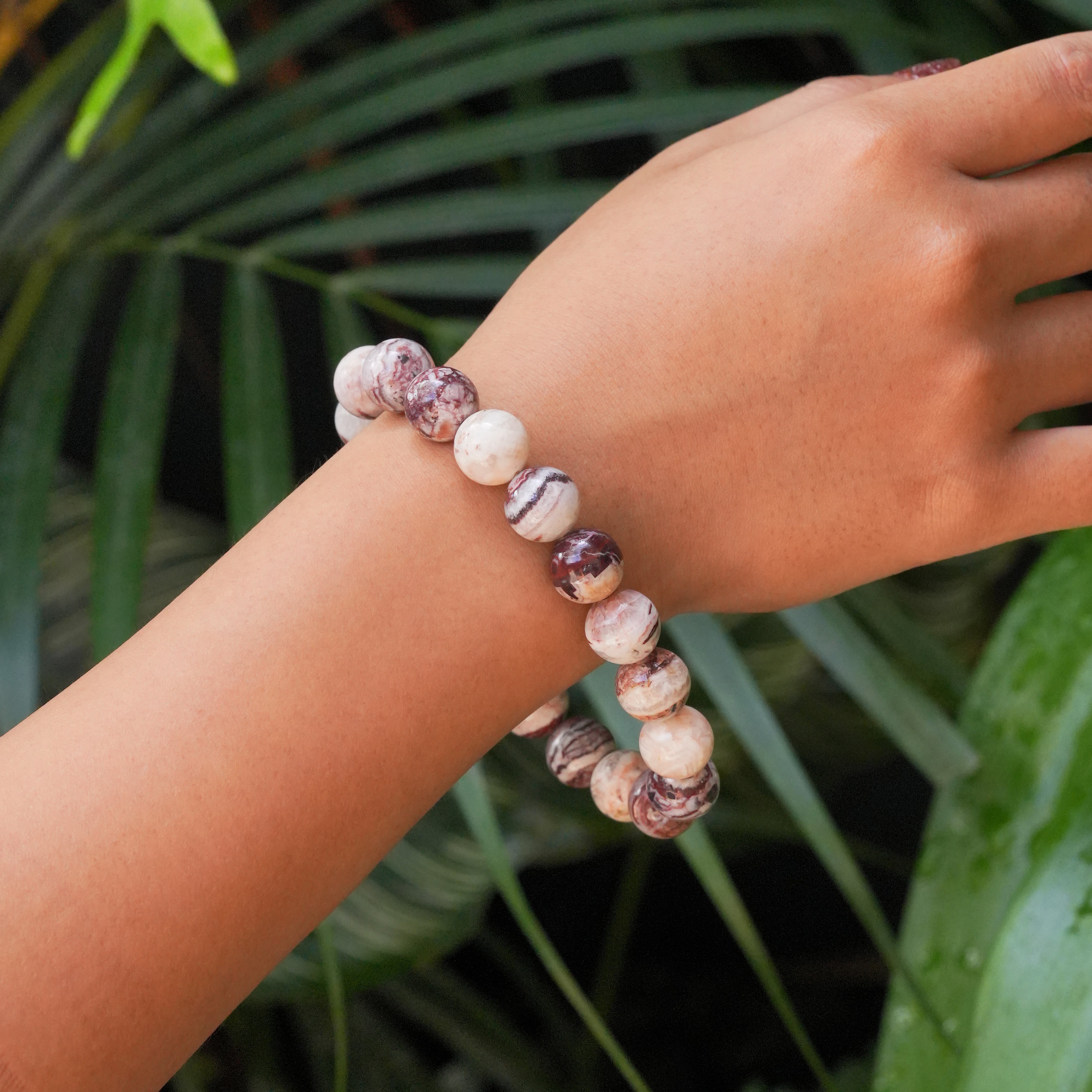 Arizona Agate Mountain bead bracelet worn on a wrist to for size reference.