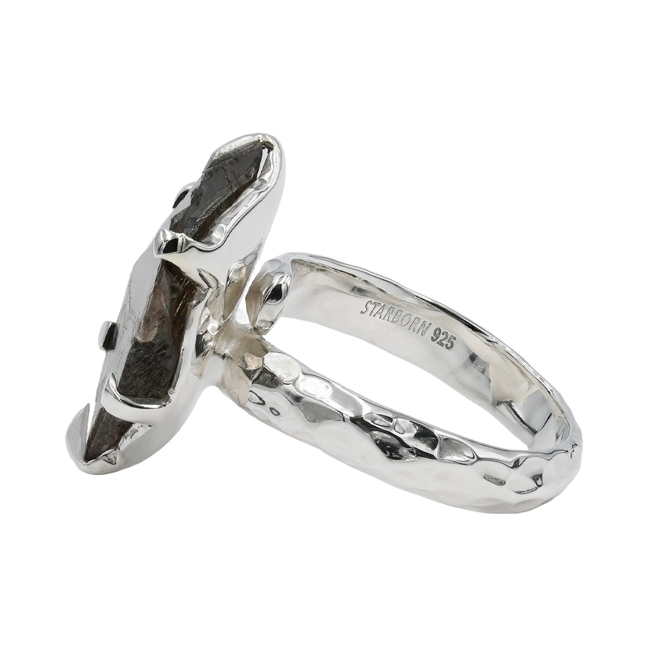 Side view of an Axinite prong‑set ring showing the stone thickness and the hammered band