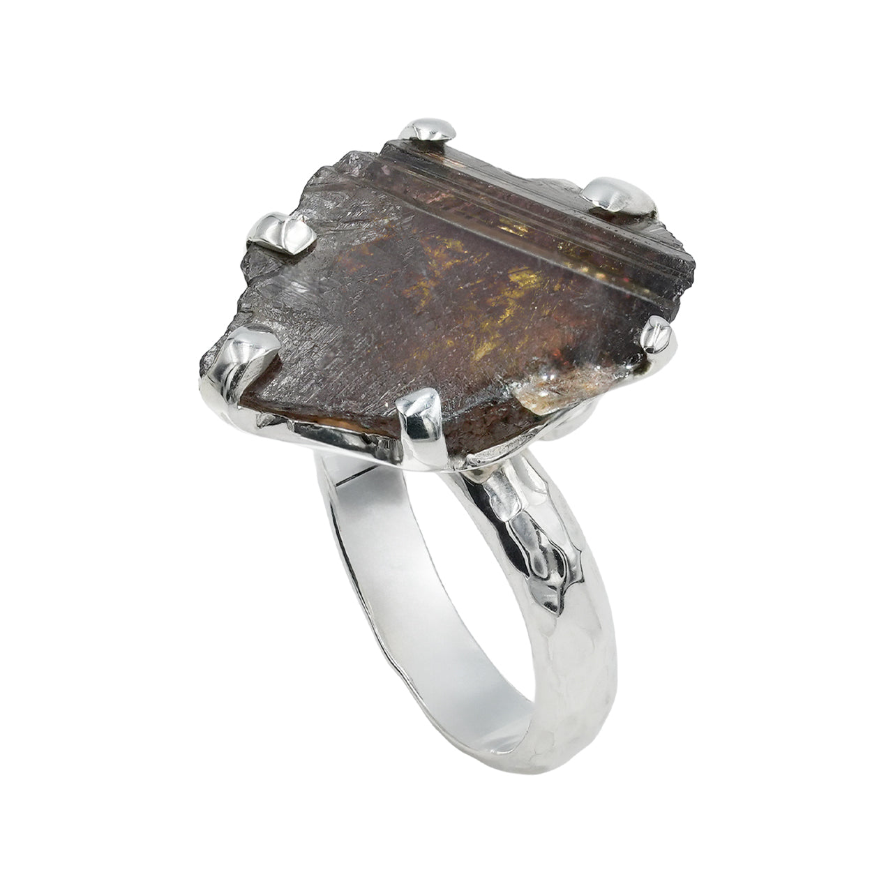 Angled view of an Axinite prong‑set ring showing the free‑form crystal and the hammered band