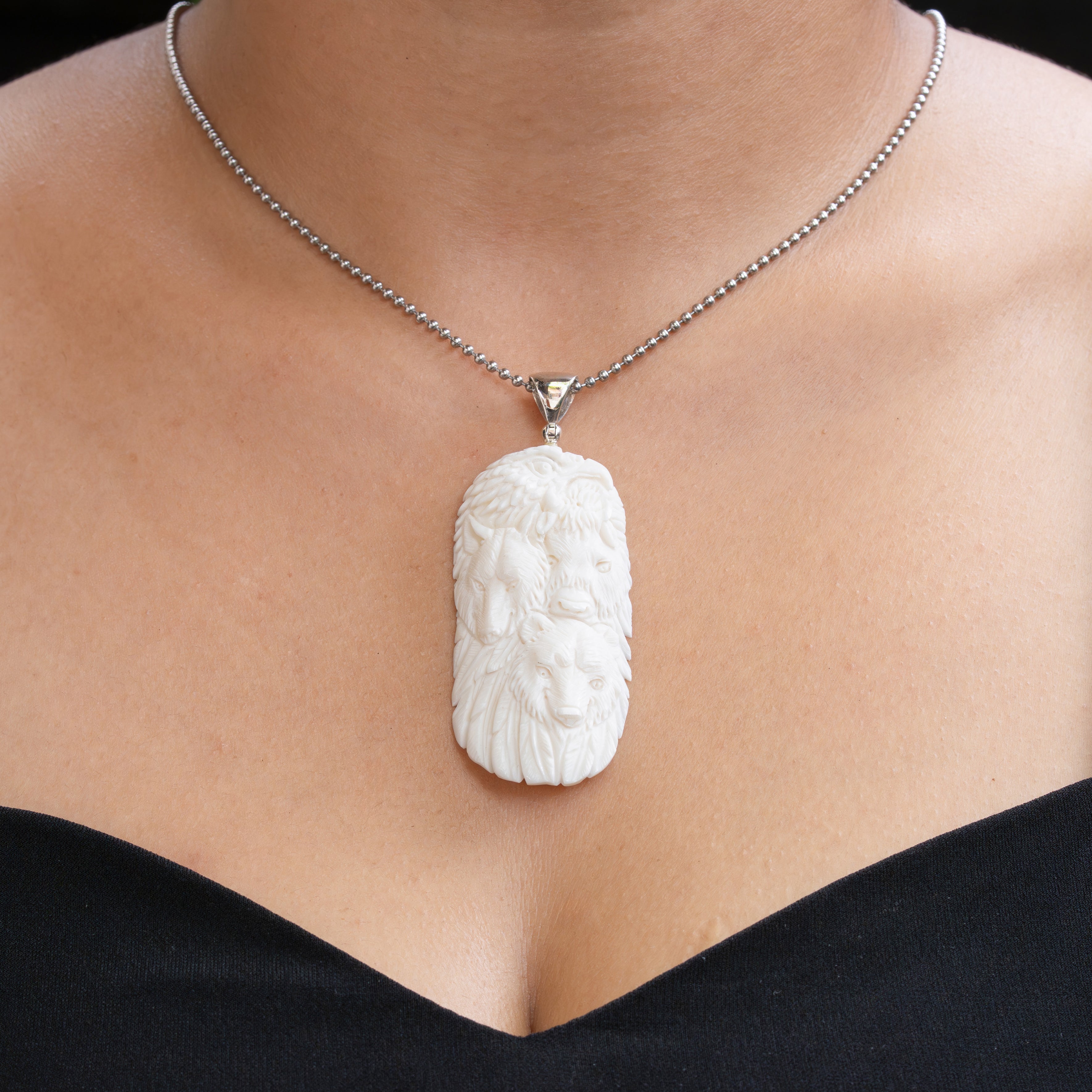 Starborn Carved Buffalo Bone Pendant Eagle, Wolf, Bison, & Bear in Sterling Silver