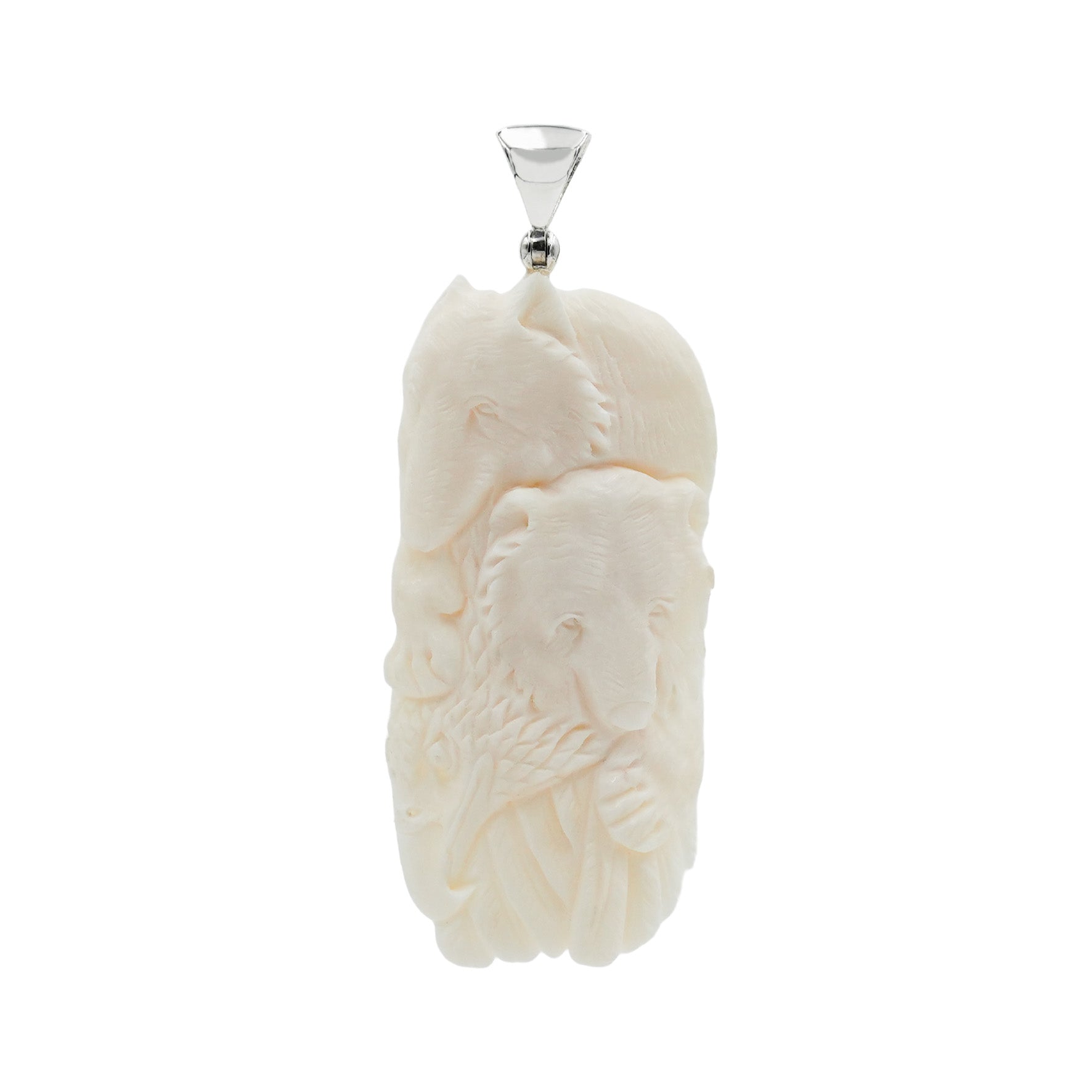 Front-facing view of a carved buffalo bone pendant depicting an eagle, bear, and wolf in relief, with an elongated rectangular shape, rounded edges, detailed carving, and a silver bail at the top.