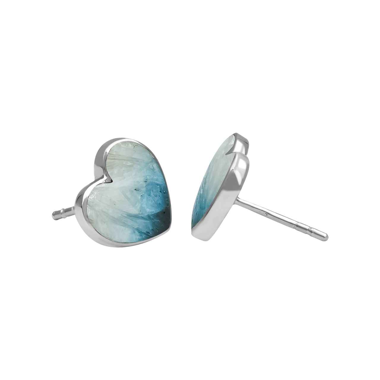 Side‑view image of the Blue Ice Glacierite heart stud earrings, showing the thickness of the heart‑shaped stones, the silver bezel edges, and the straight silver posts extending from the back.