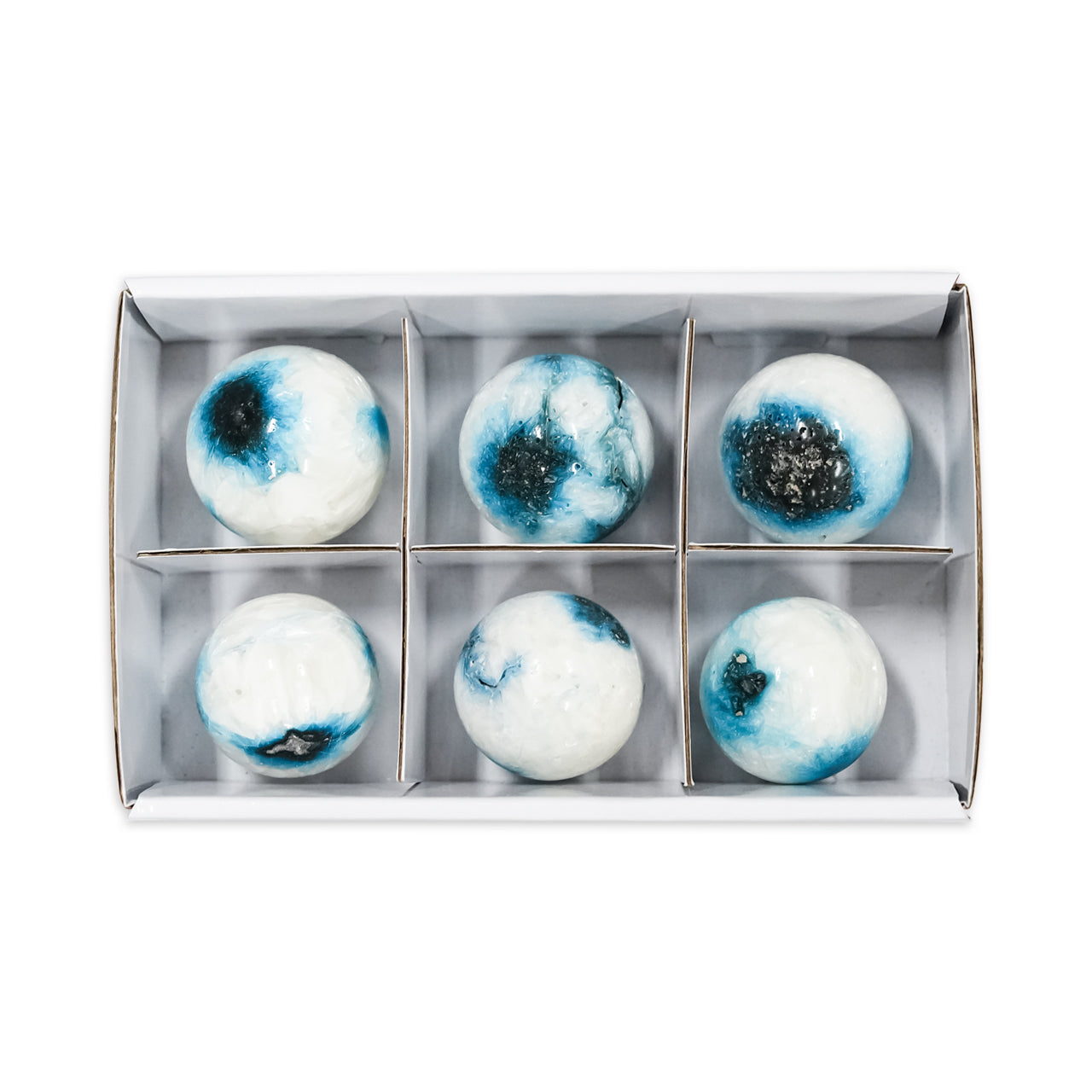 Front‑view image of Blue Ice Glacierite spheres placed inside a sturdy flat box with sections, showing each polished sphere positioned in its own compartment.