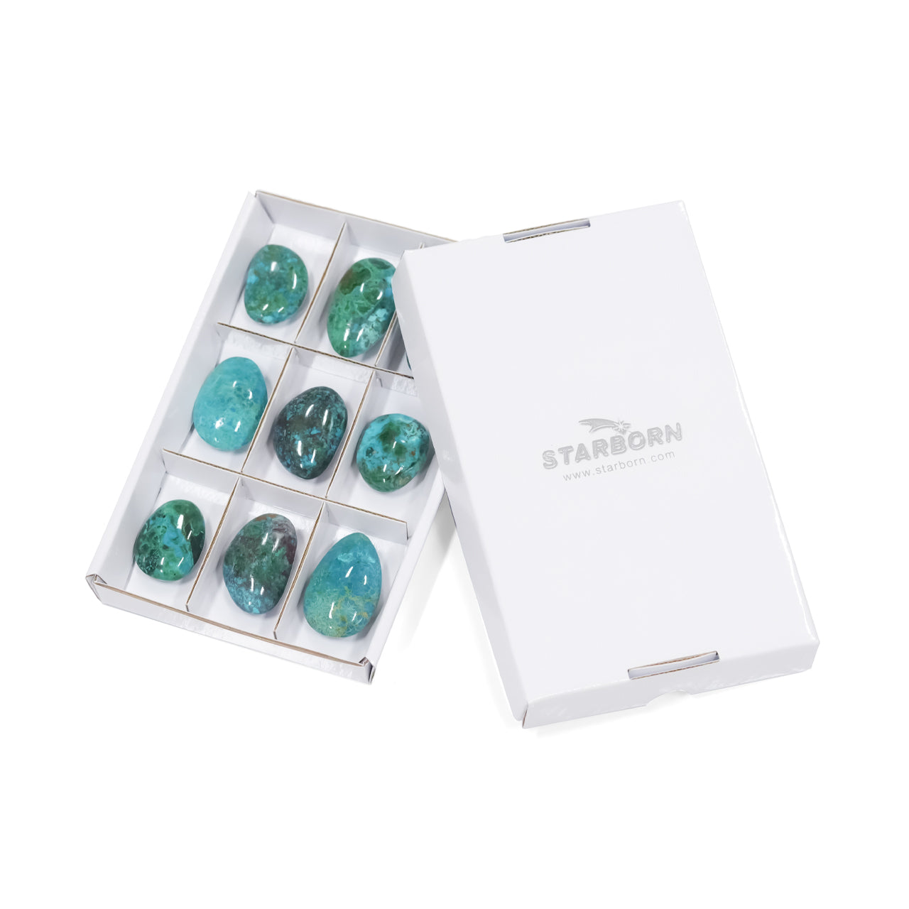Image showing the nine polished chrysocolla freeform palm stones in the sectioned flat box placed next to the matching box lid, demonstrating how the set is packaged.