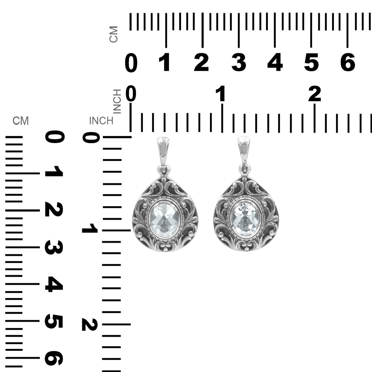 Colgante elegante con piedras preciosas en forma de pergamino facetado de Starborn en plata de ley
