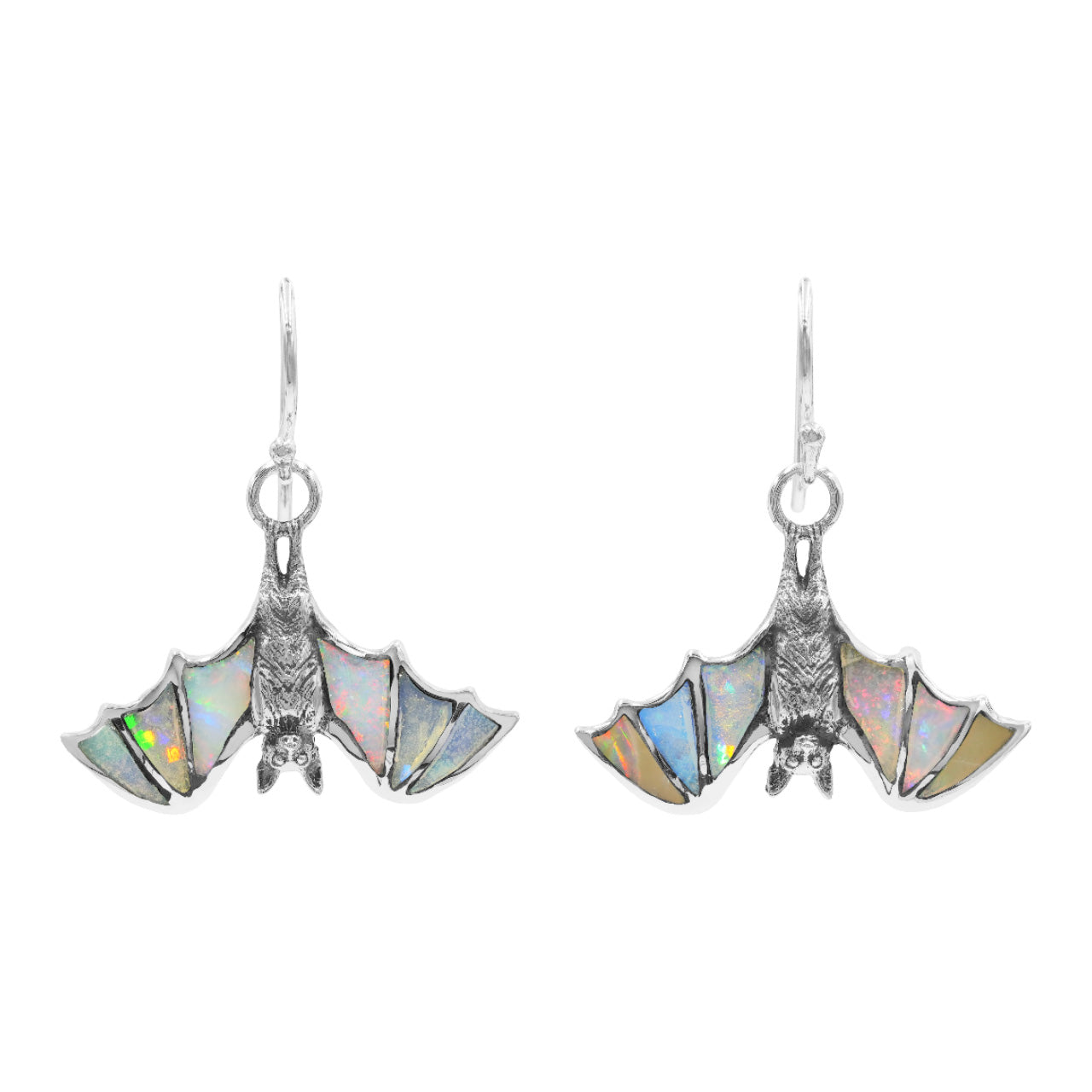 Front view of hanging bat earrings with Ethiopian opal inlay arranged to resemble bat wing veining, showing natural play‑of‑color