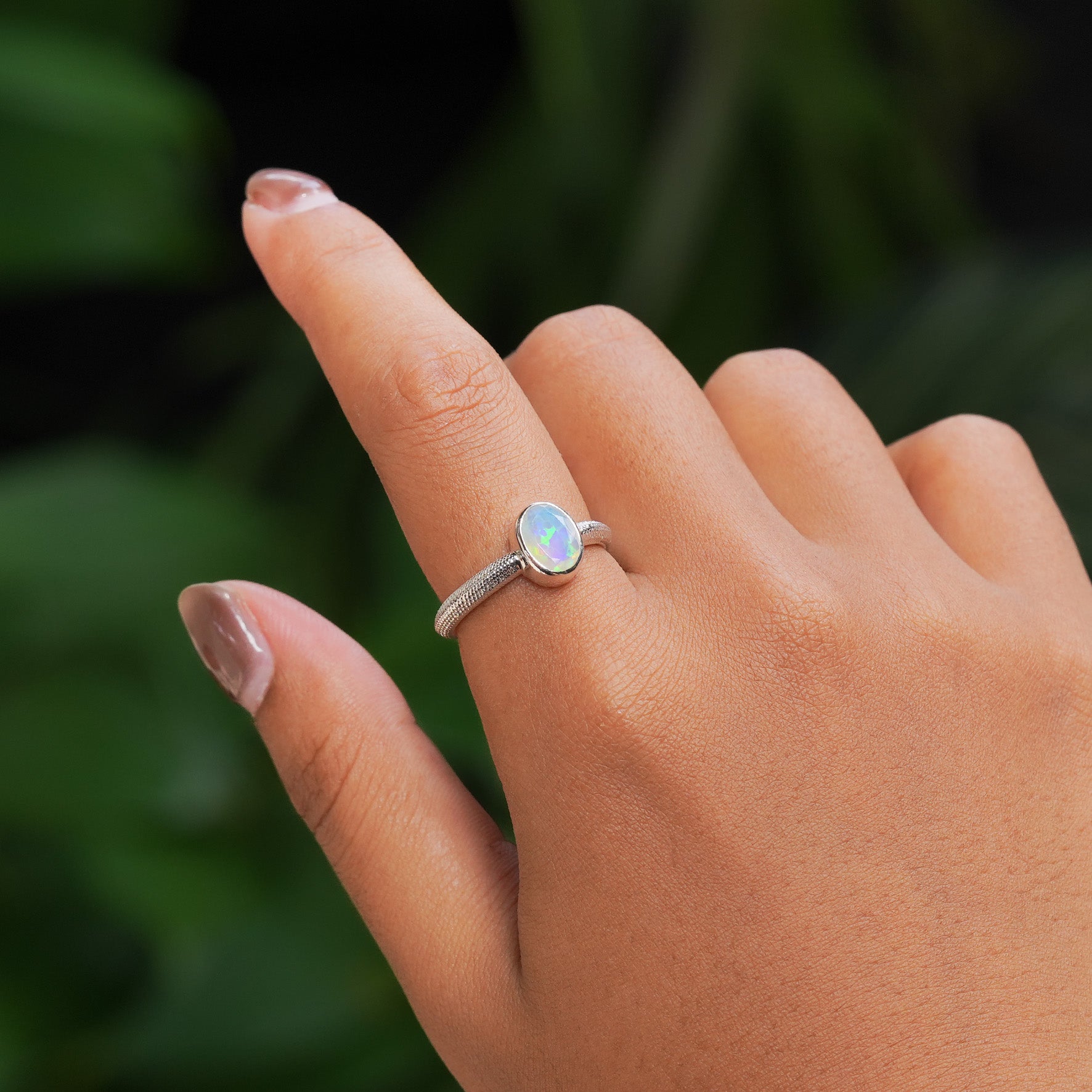 Starborn Ouroboros Ring with Faceted Natural Ethiopian Opal in Sterling Silver
