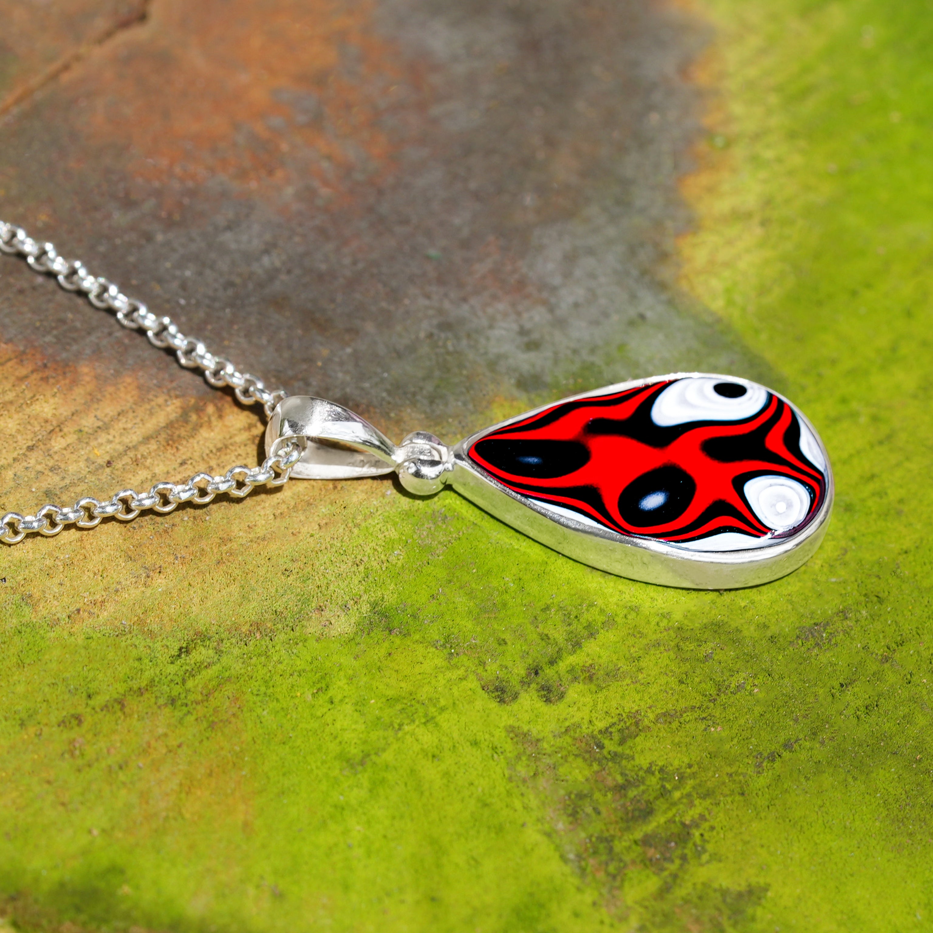 Starborn Red Fordite Pendant in Sterling Silver
