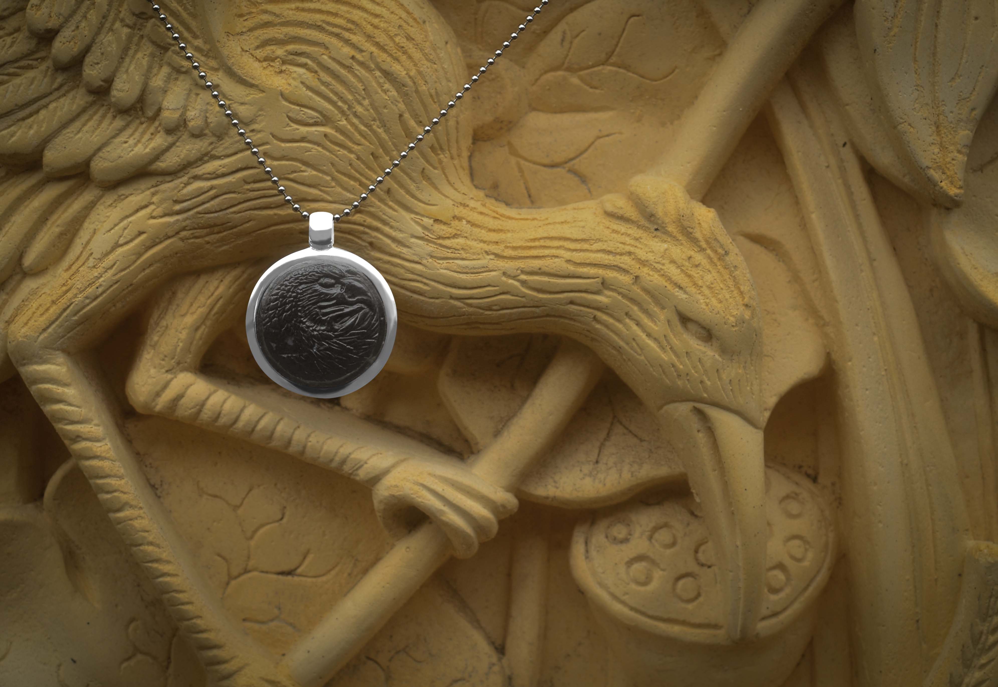Starborn Fossil Wood Carved Eagle Head Medallion Style Pendant in Sterling Silver