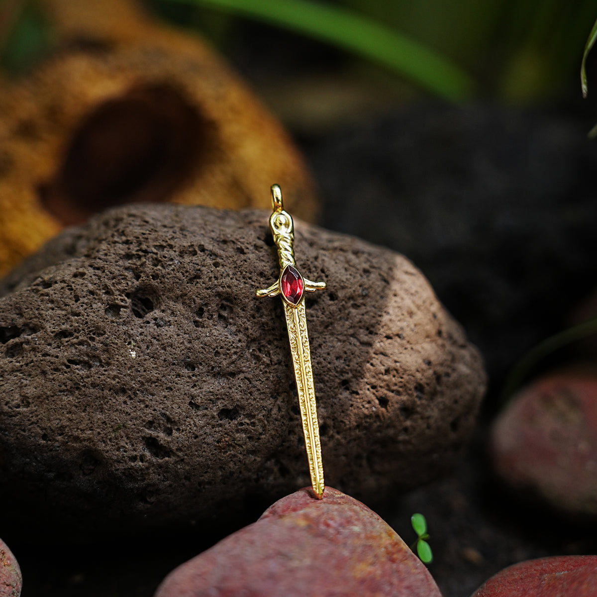 Starborn Garnet Sword Pendant