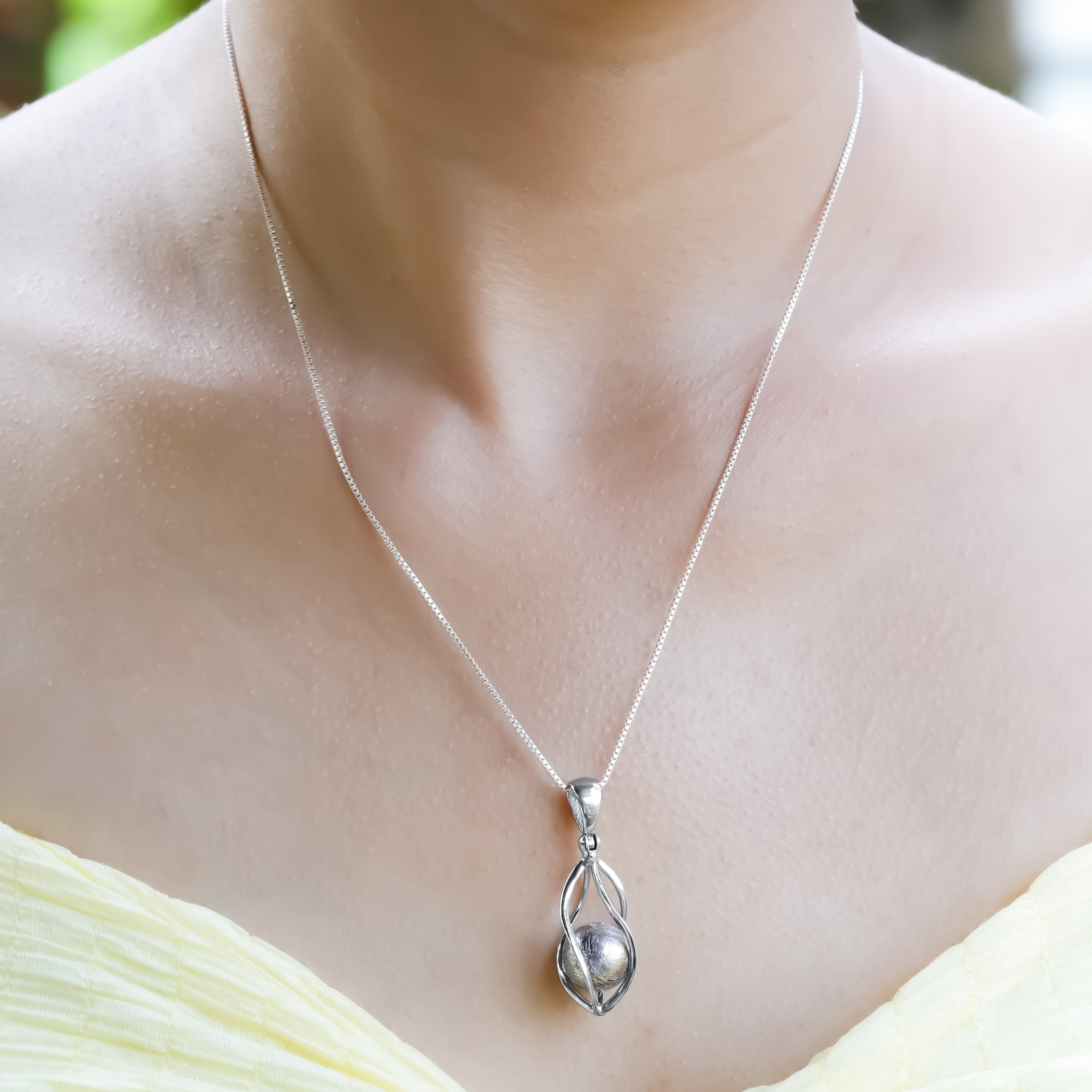 Genuine Muonionalusta Meteorite Sphere Cage Set Pendant in Sterling Silver
