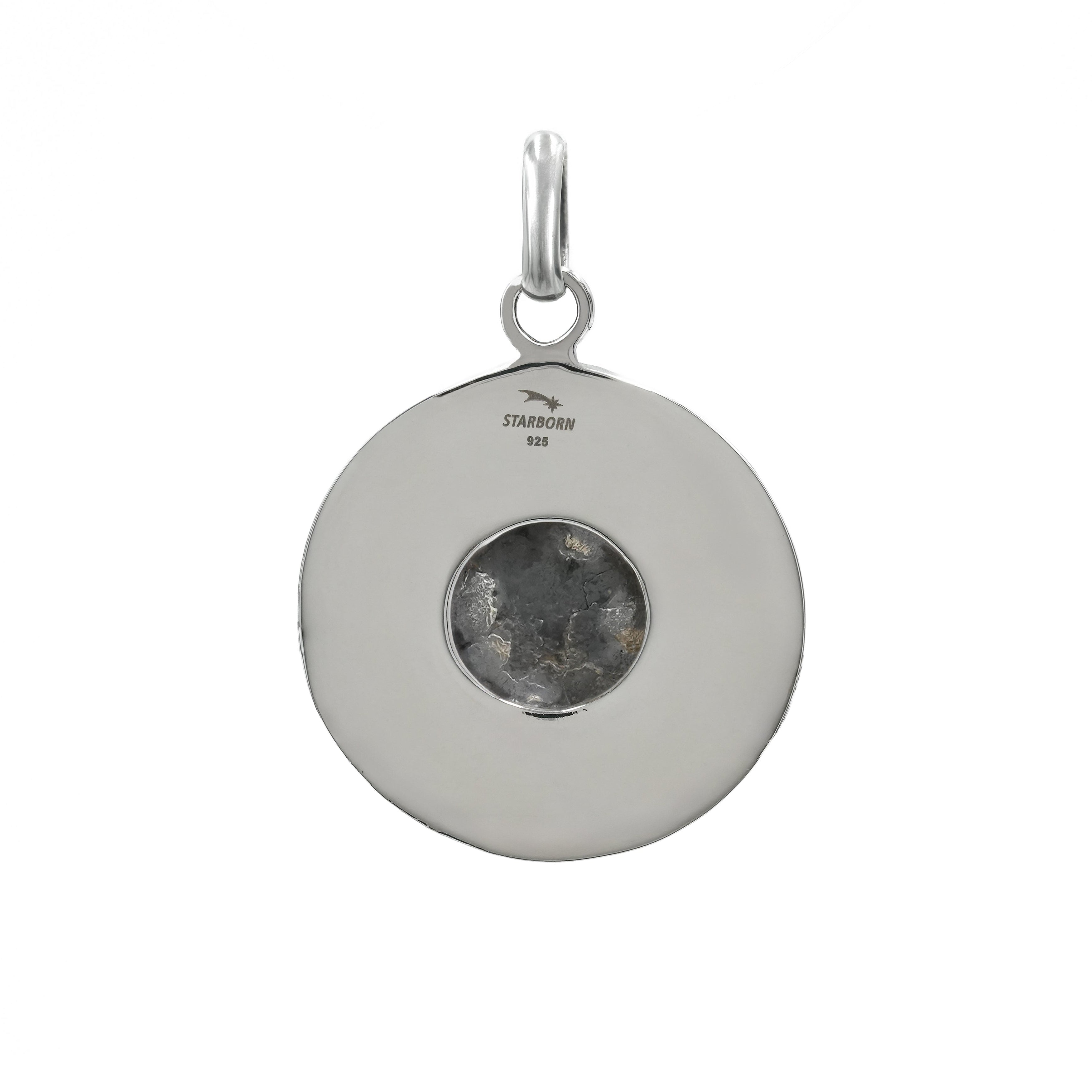 Back view of a sterling silver moon phases pendant showing the reverse side of the setting.