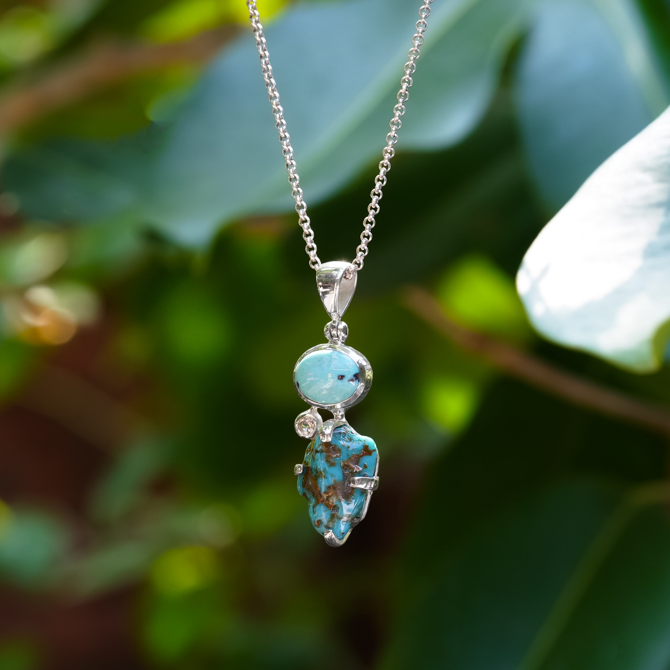 Starborn Campitos Turquesa con Topacio Blanco en Plata de Ley