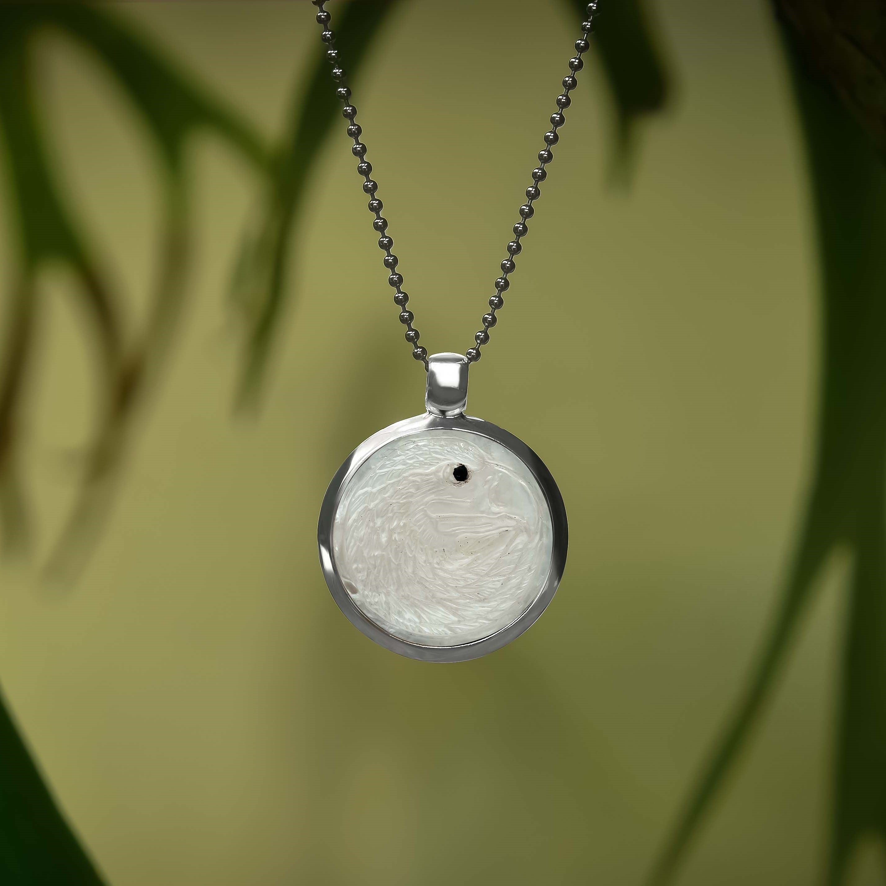 Starborn Mother of Pearl Carved Eagle Head Medallion Style Pendant in Sterling Silver