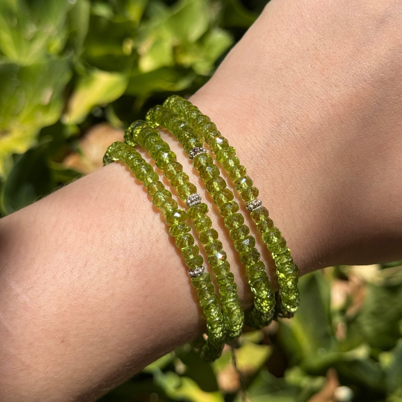 Starborn Peridot Rondelle Faceted Bead Bracelet with 4 Silver Beads Accents