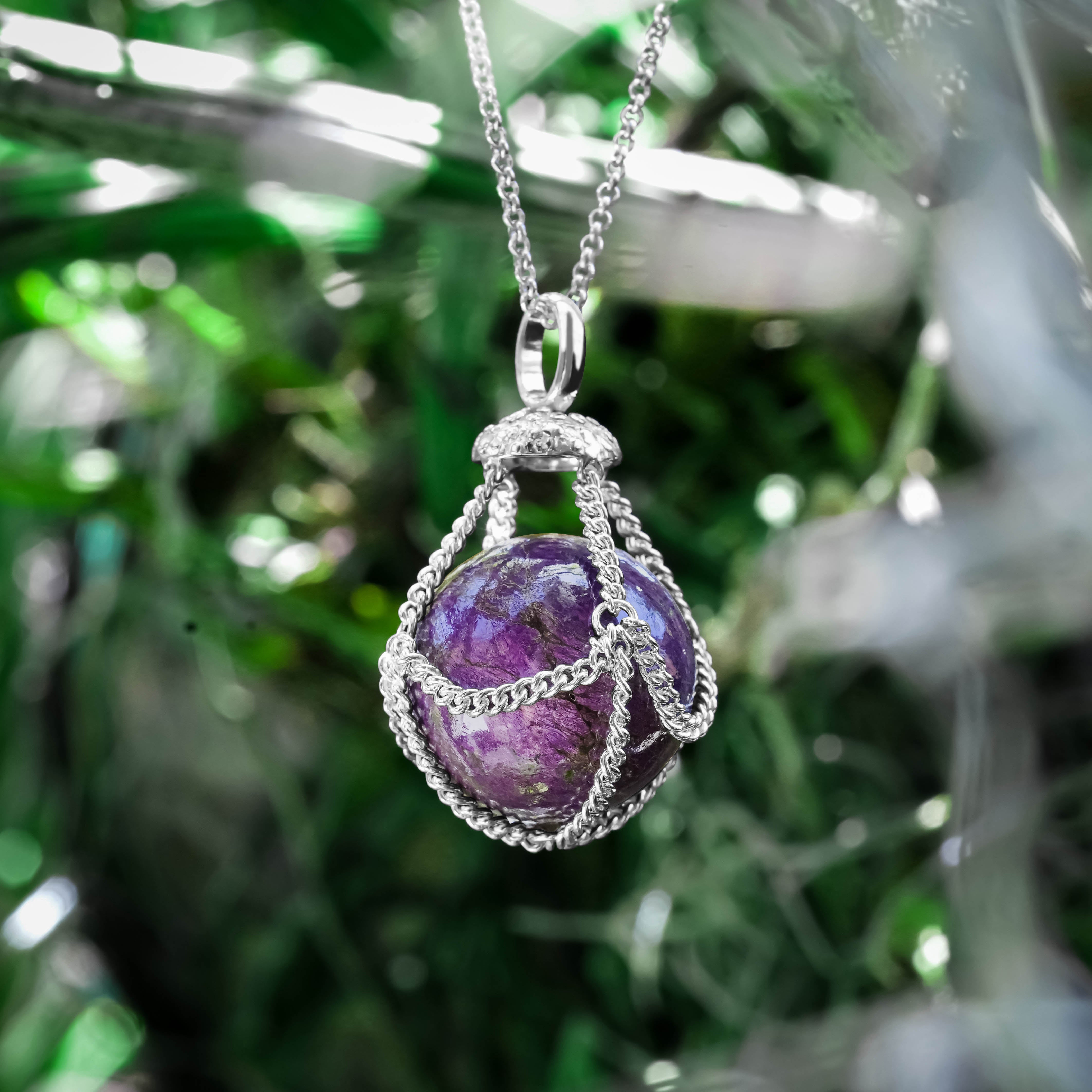 Colgante con forma de cesta y piedra preciosa esférica de Starborn en plata de ley