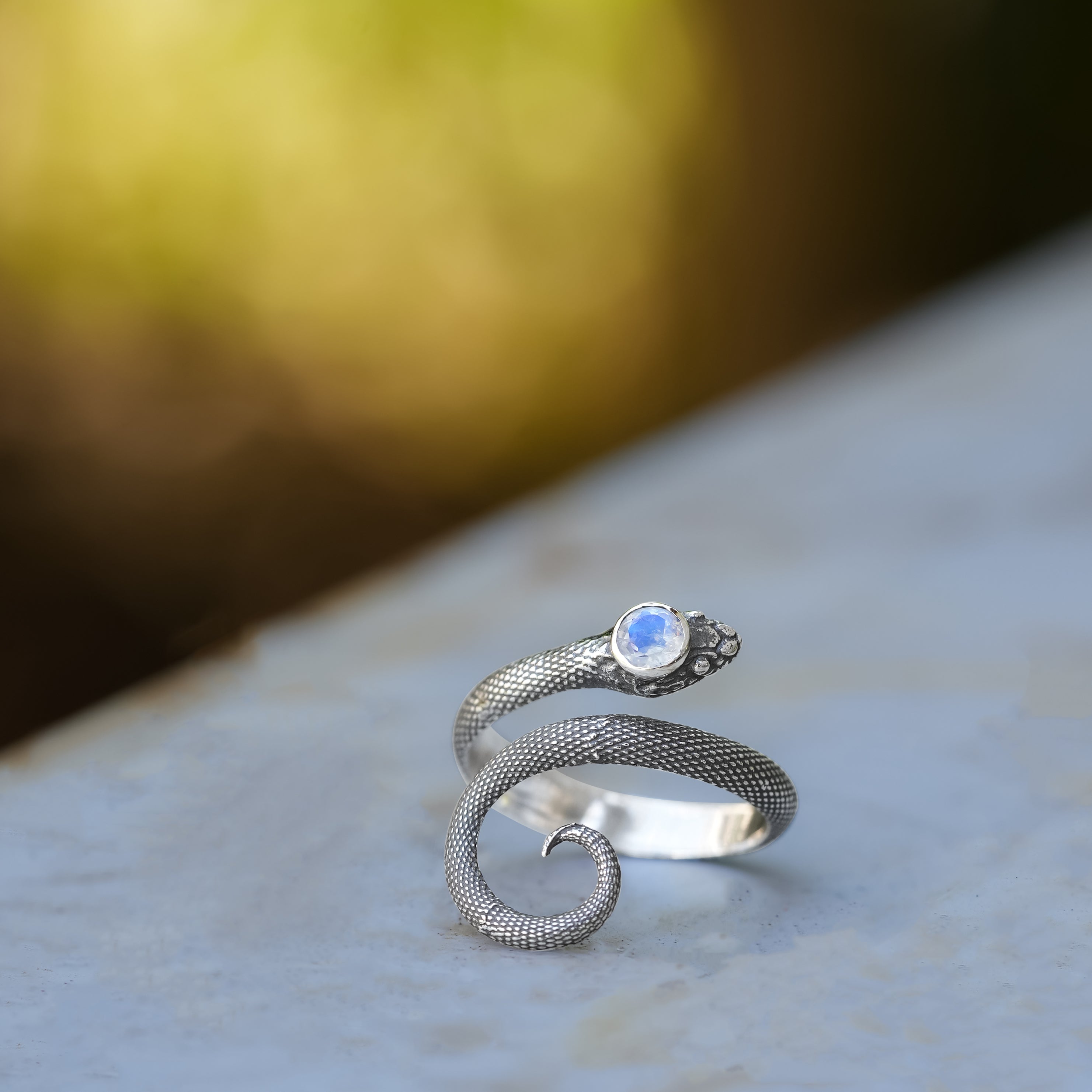 Starborn Coiled Snake Ring with Faceted Rainbow Moonstone in Sterling Silver