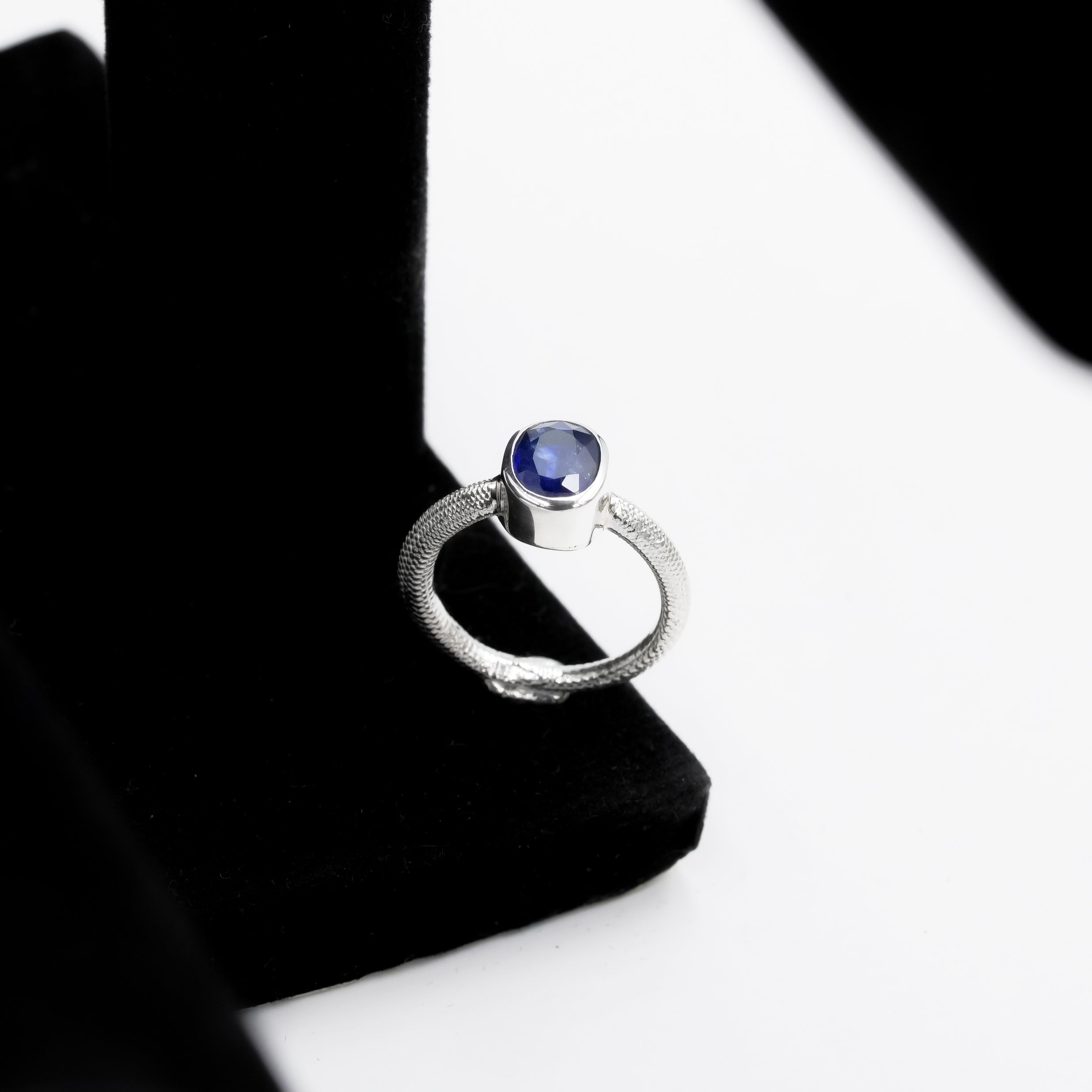 Starborn Ouroboros Ring with Oval Faceted Sapphire in Sterling Silver