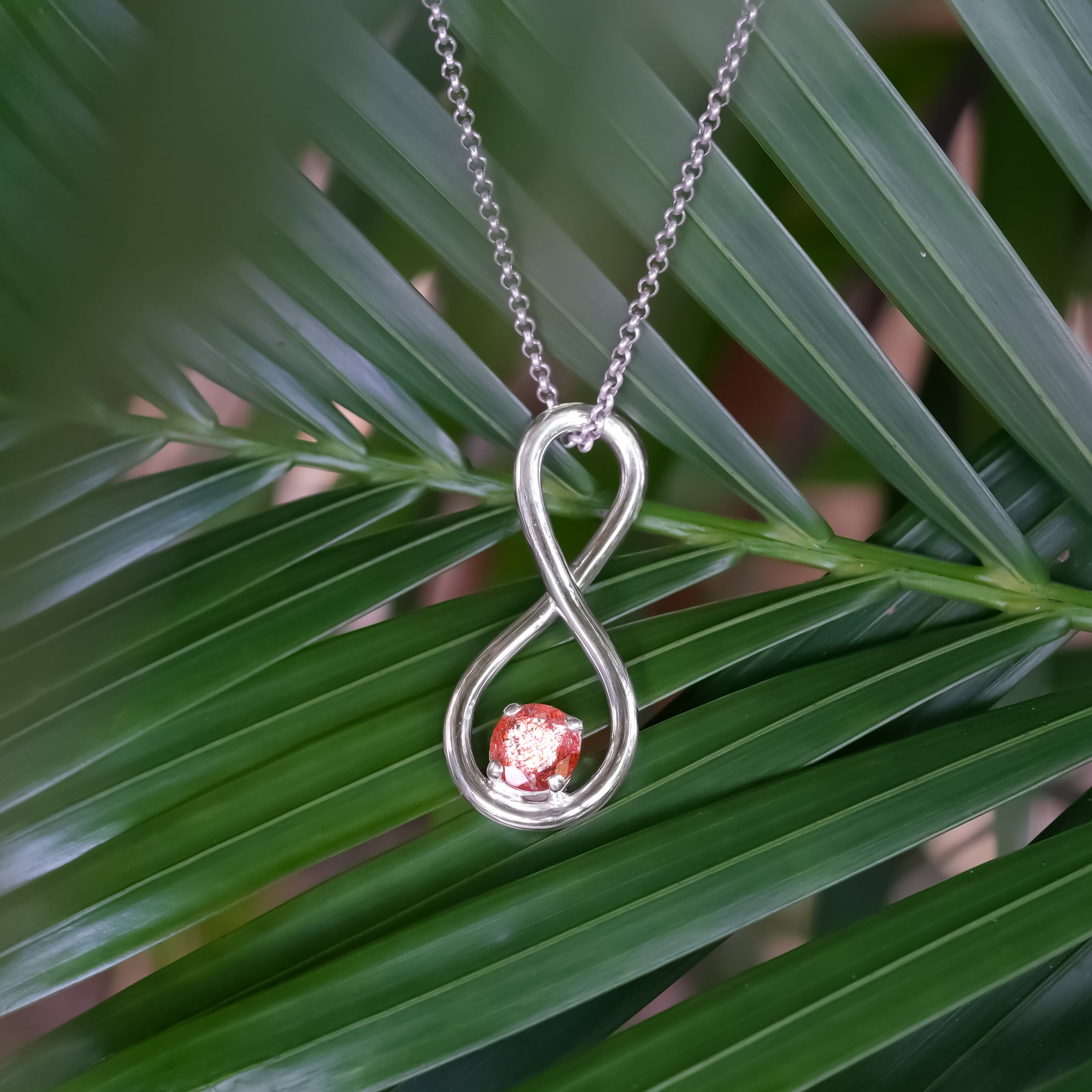 Starborn Faceted Sunstone Infinity Pendant in Fine Sterling Silver