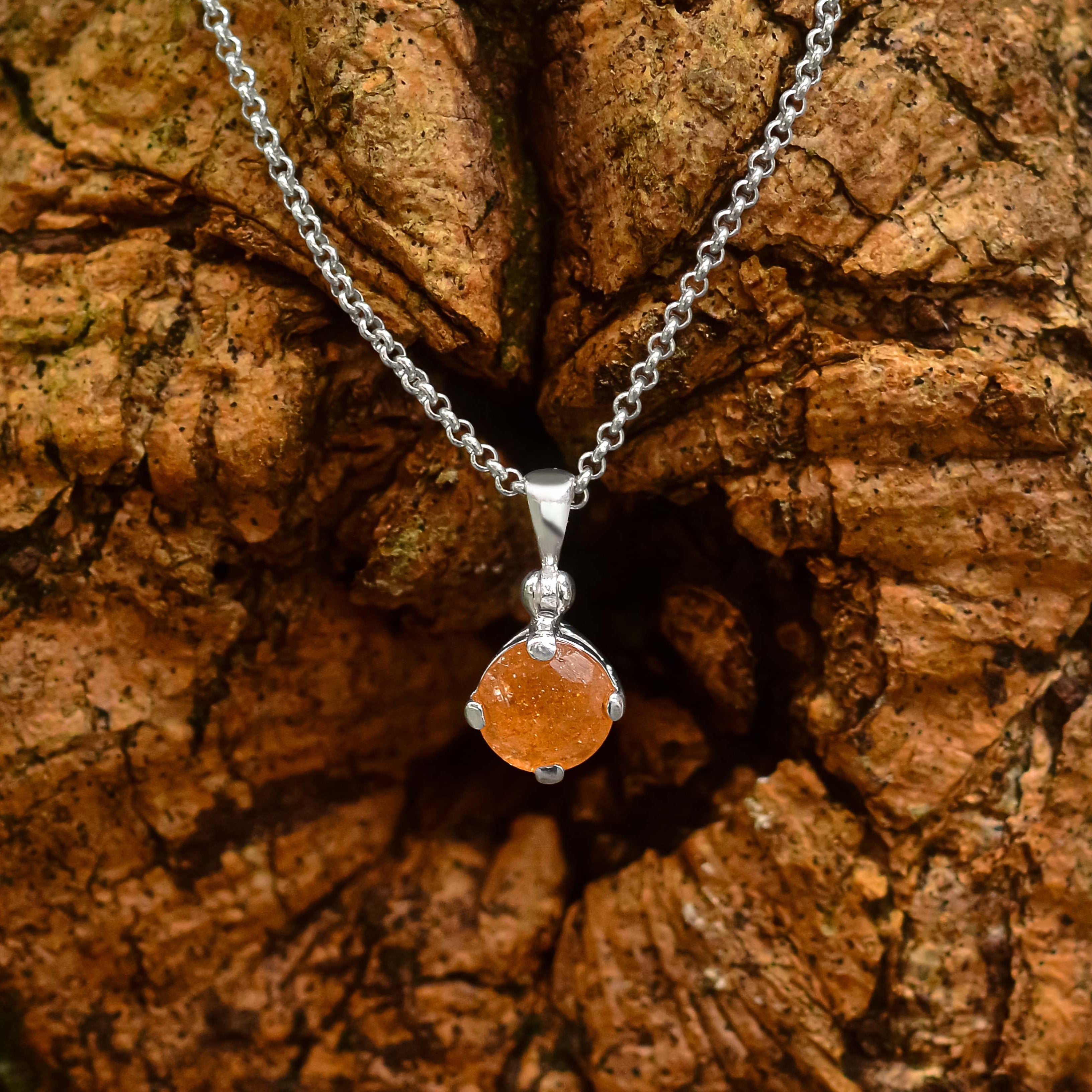 Starborn Round Faceted Sunstone Pendant in Sterling Silver