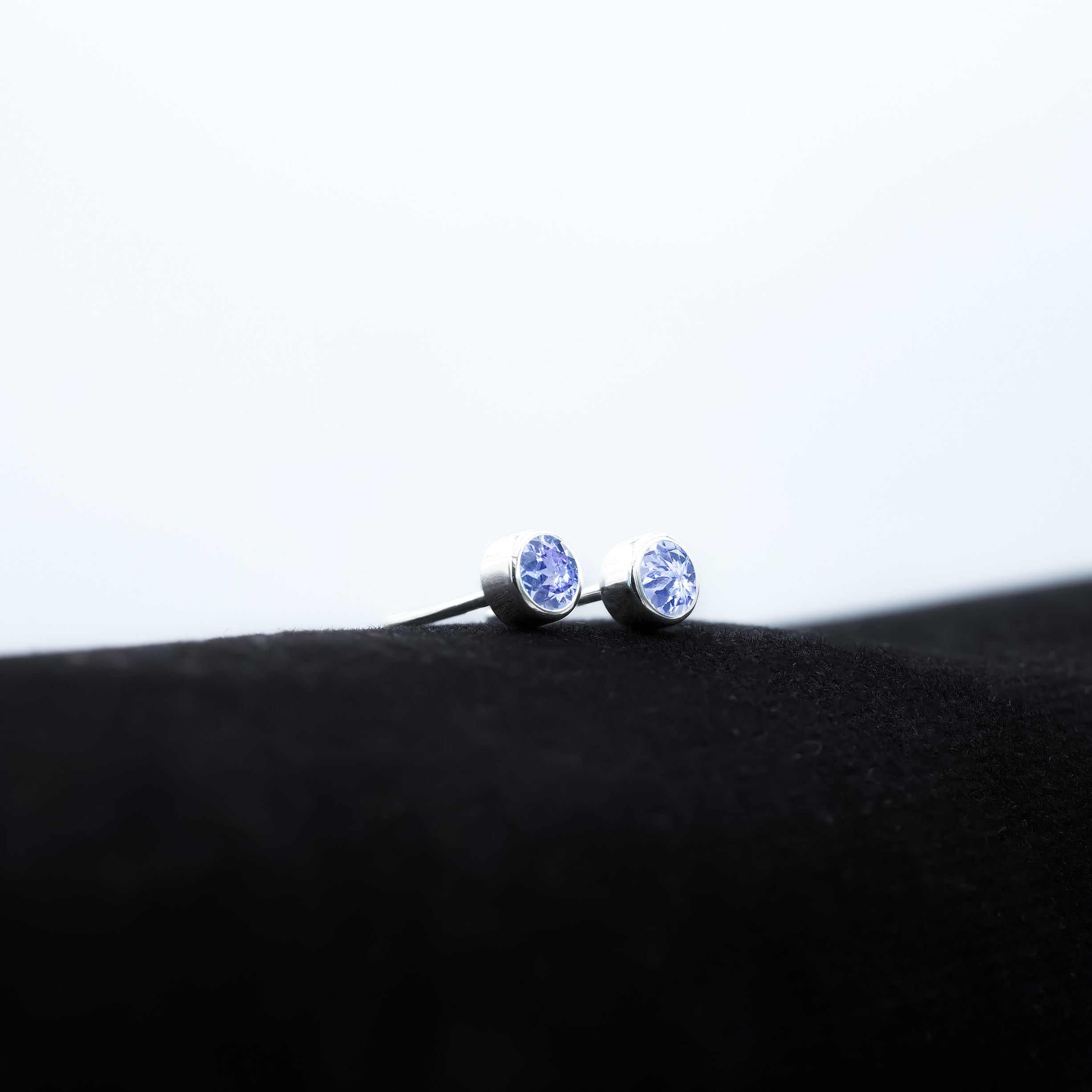 Starborn Tanzanite Faceted Round 4mm Bezel Style Post Earrings in Sterling Silver