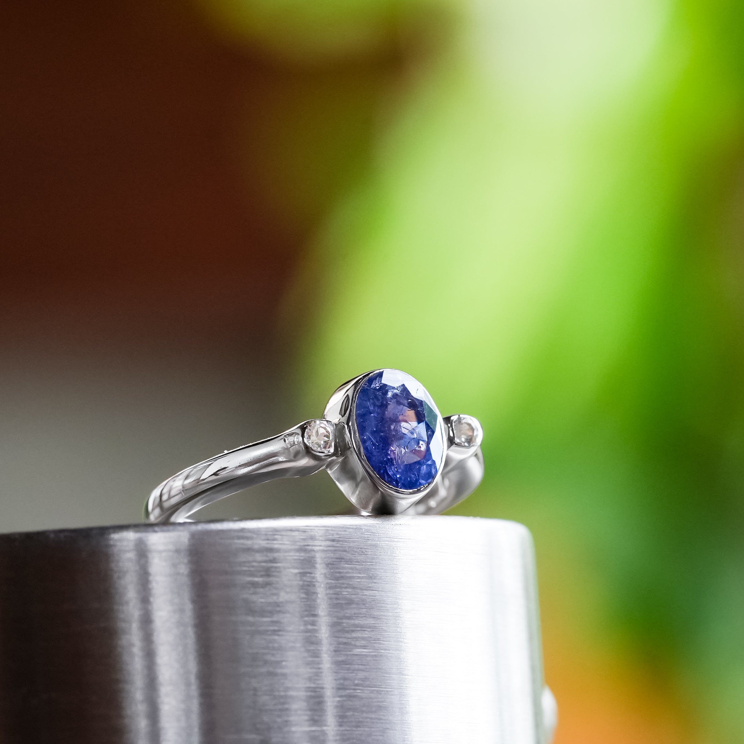 Starborn Faceted Tanzanite Ring with Topaz Accents in Sterling Silver