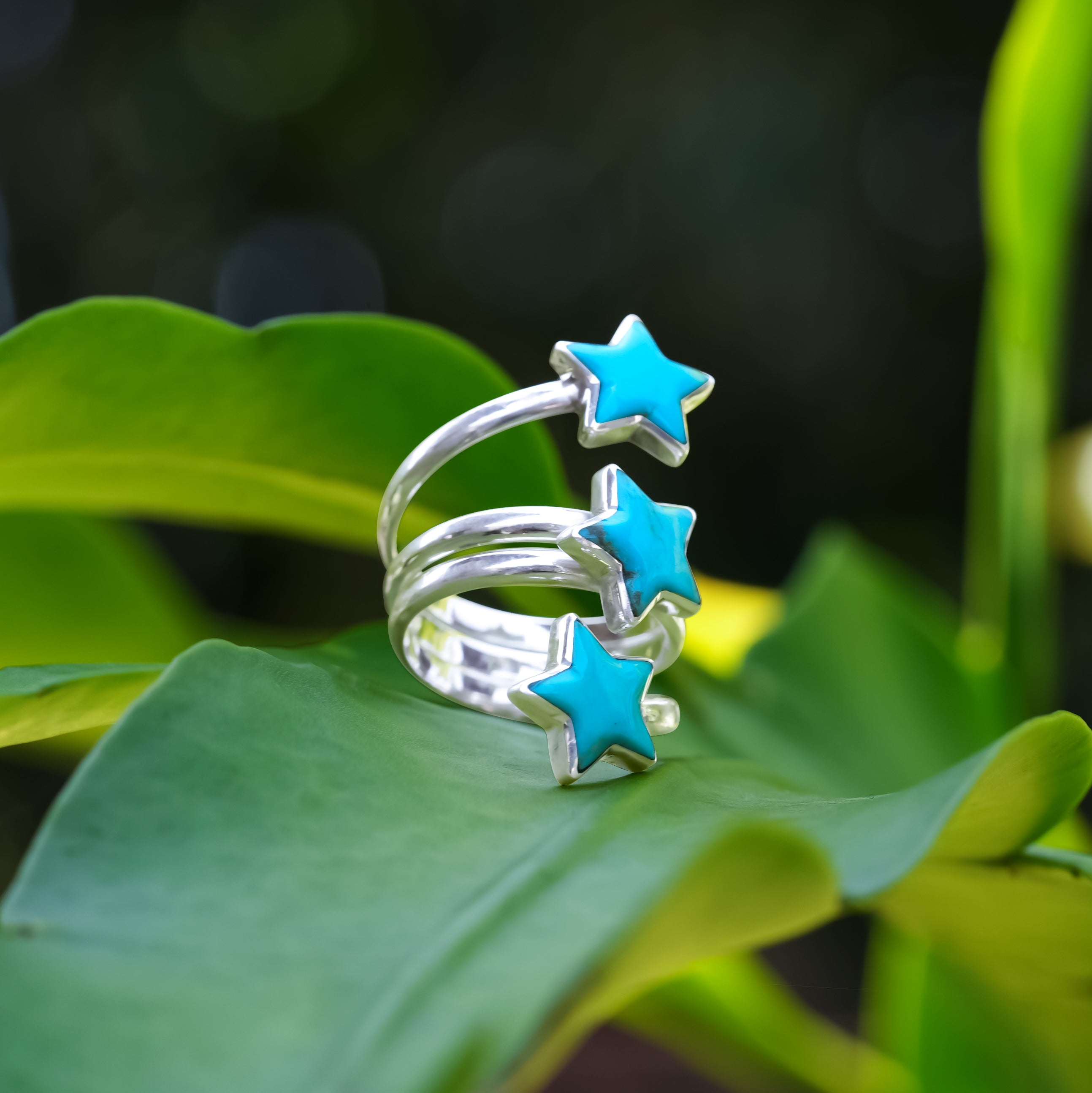 Anillo en espiral de 3 estrellas turquesa Starborn en plata de ley