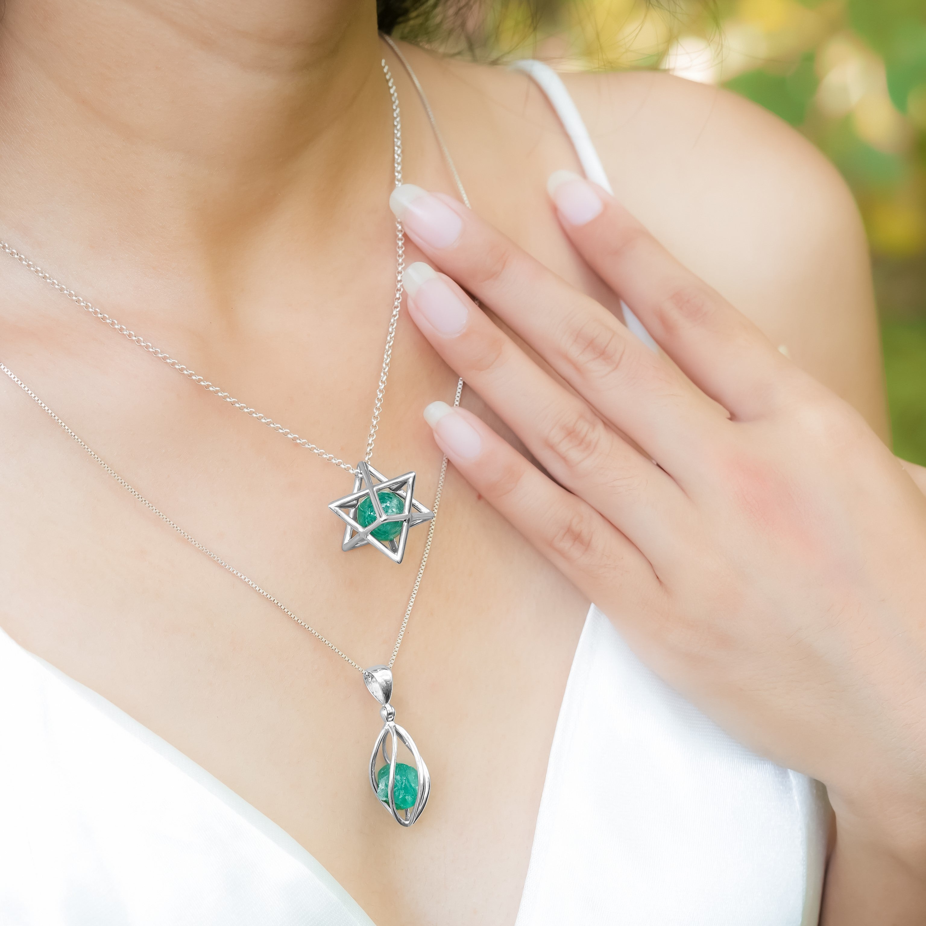 Starborn Emerald Crystal Caged Pendant in Sterling Silver