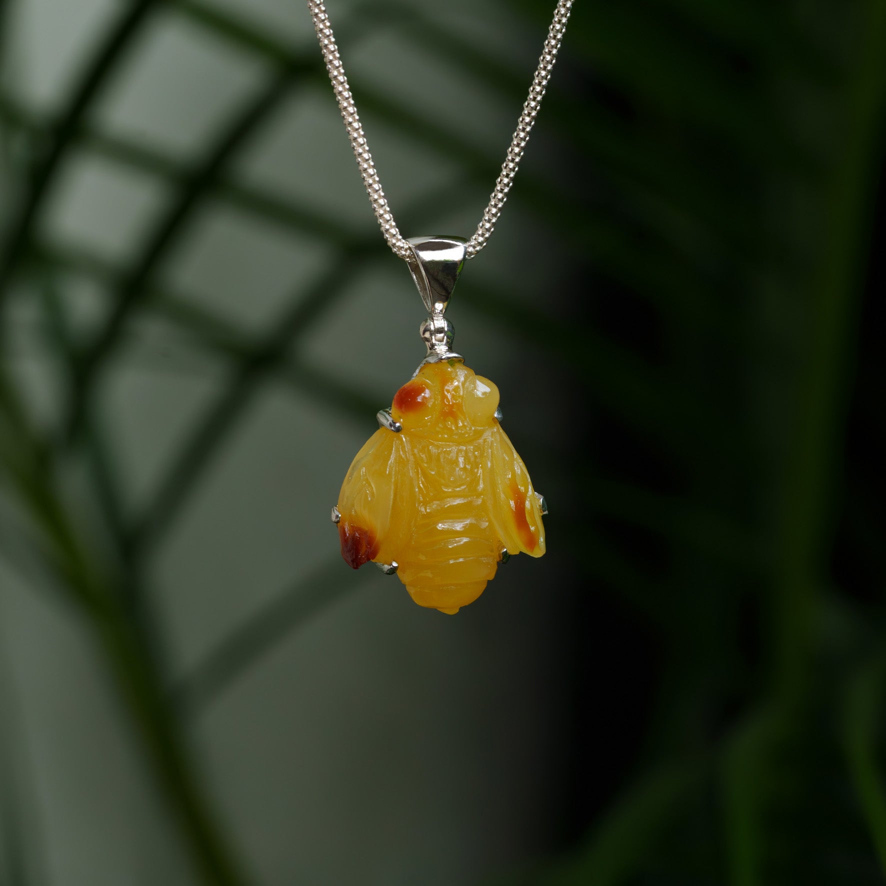 Starborn Hand-Carved Baltic Amber Bee Pendant in Sterling Silver