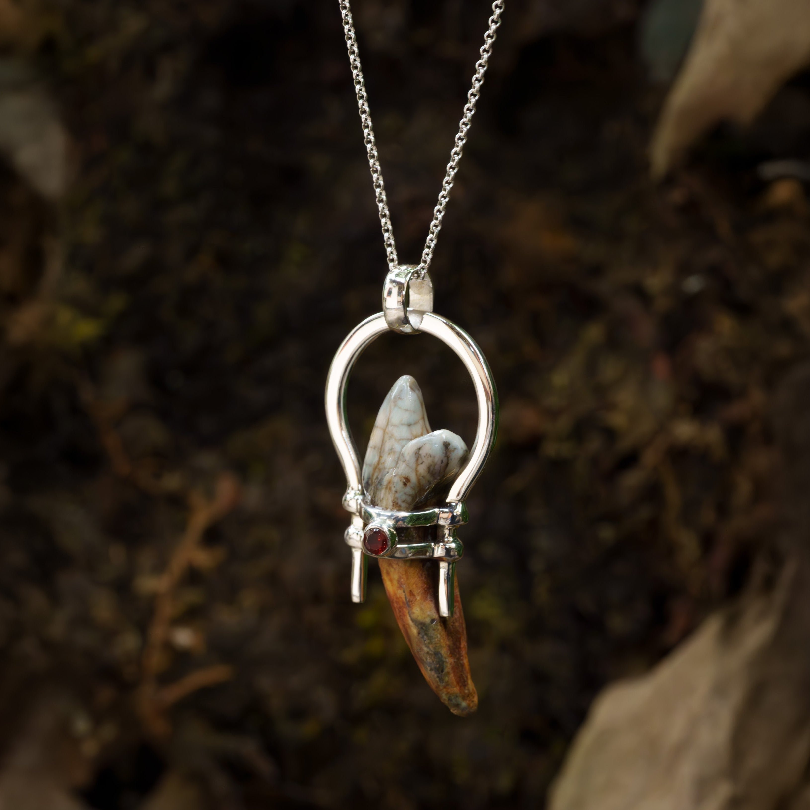 Starborn Fossil Cave Bear Tooth Pendant with Garnet Accent in Sterling Silver