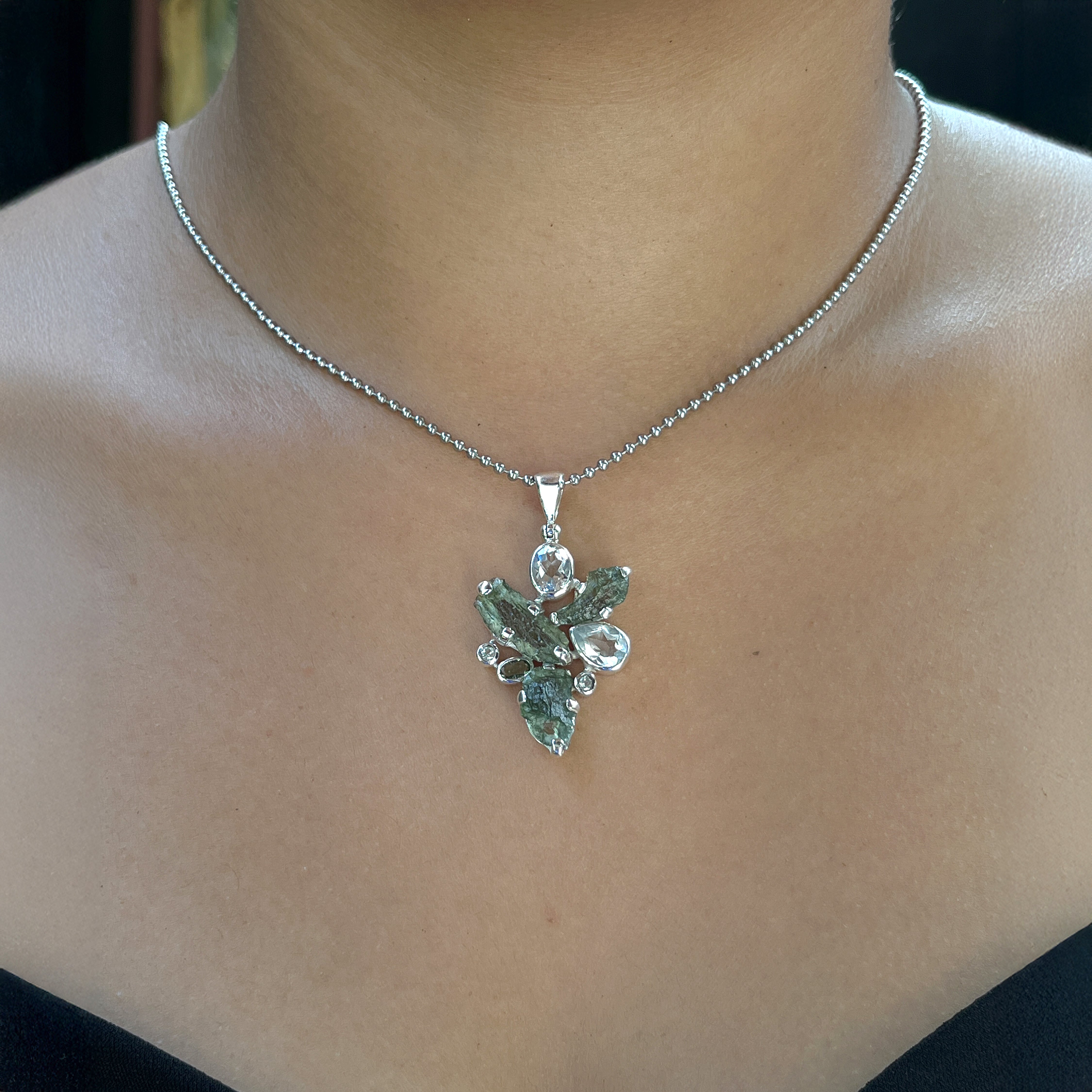 Starborn Moldavite Pendant with White Topaz Accents in Sterling Silver