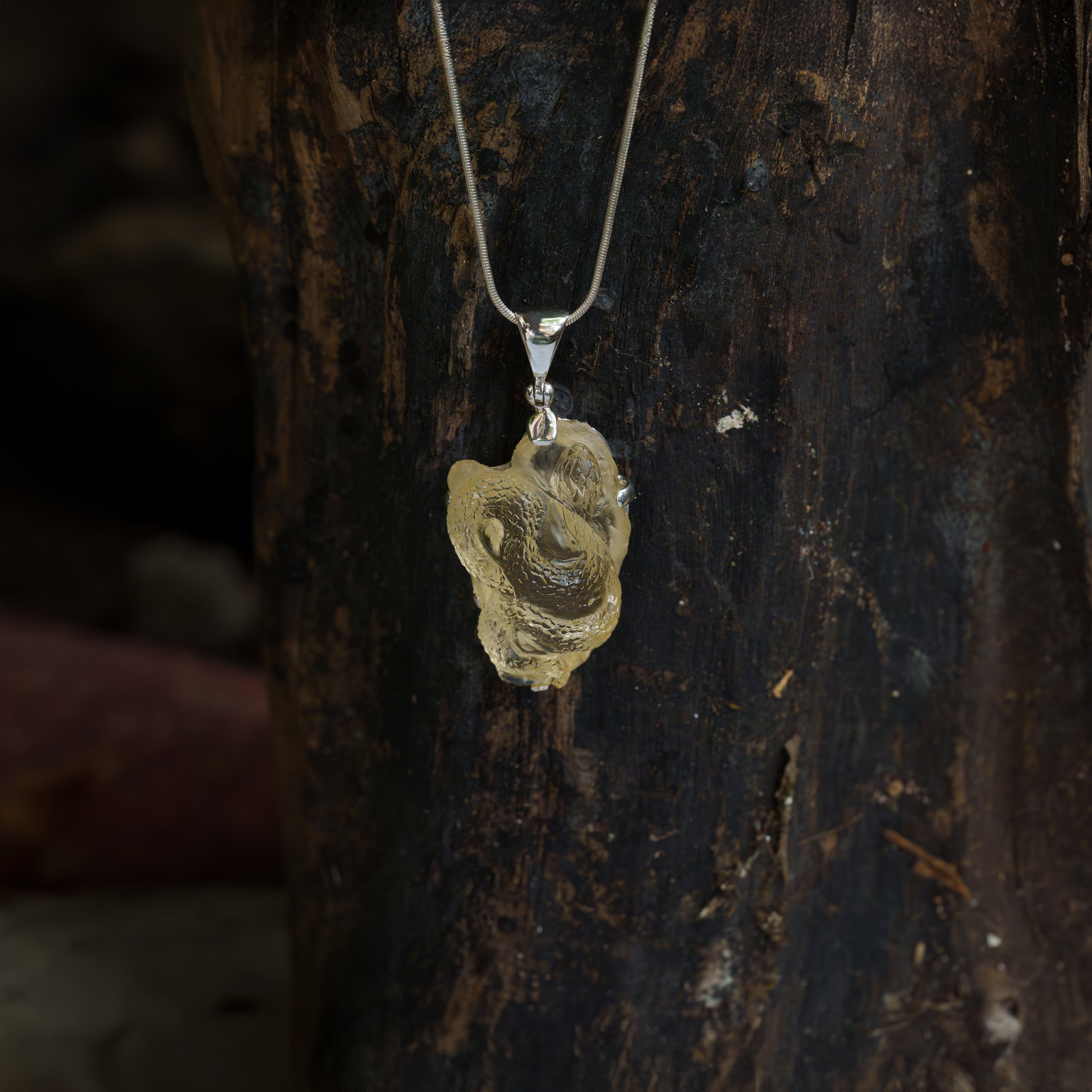 Starborn Hand-Carved Mexican Sunstone Snake Pendant in Sterling Silver