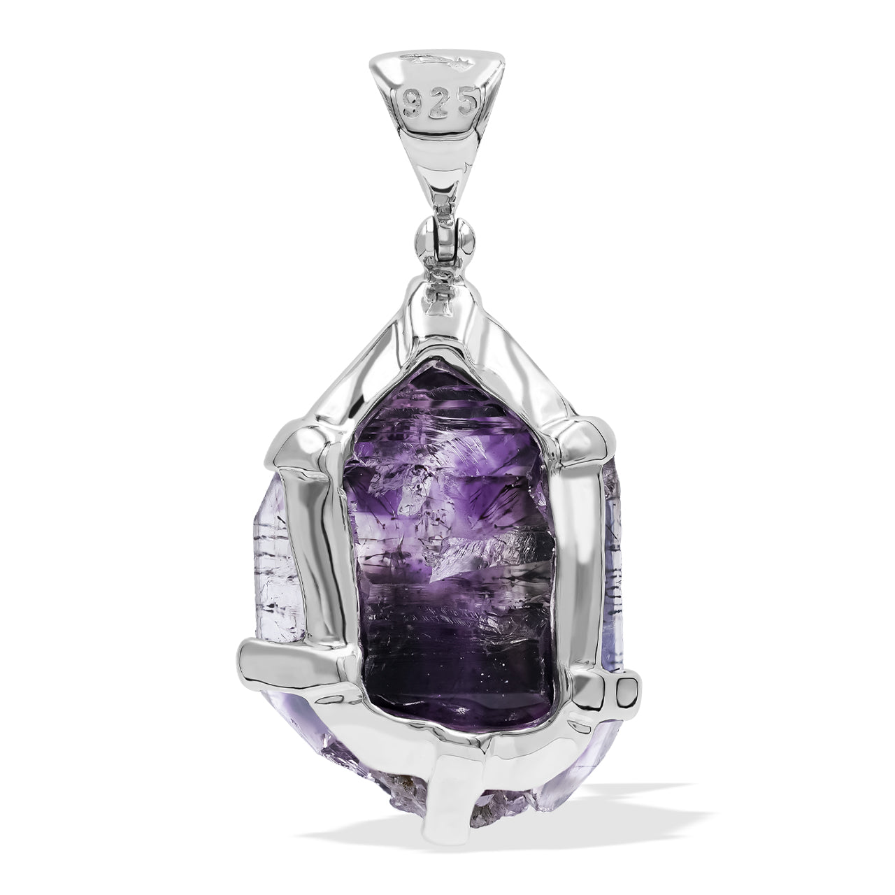 Back view of a Shangaan amethyst crystal pendant showing the silver prong placement and crystal formation.
