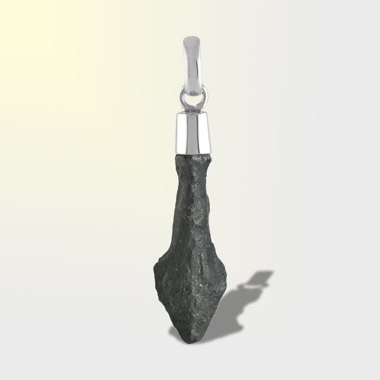 Third front‑view image of a sterling silver pendant featuring a Viking iron arrowhead with a secure cap setting.