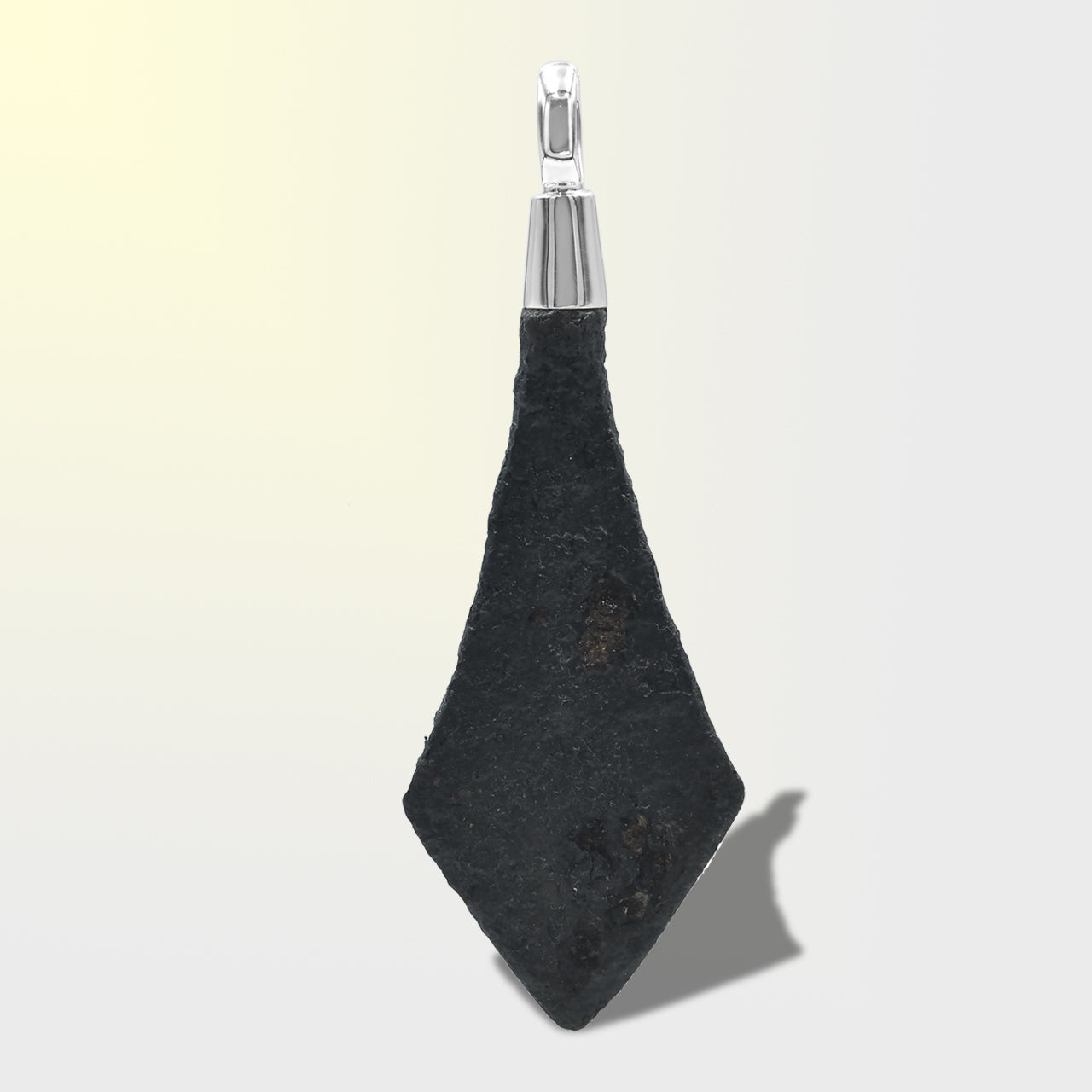 Fourth‑view of a sterling silver pendant featuring a Viking Iron Arrowhead.