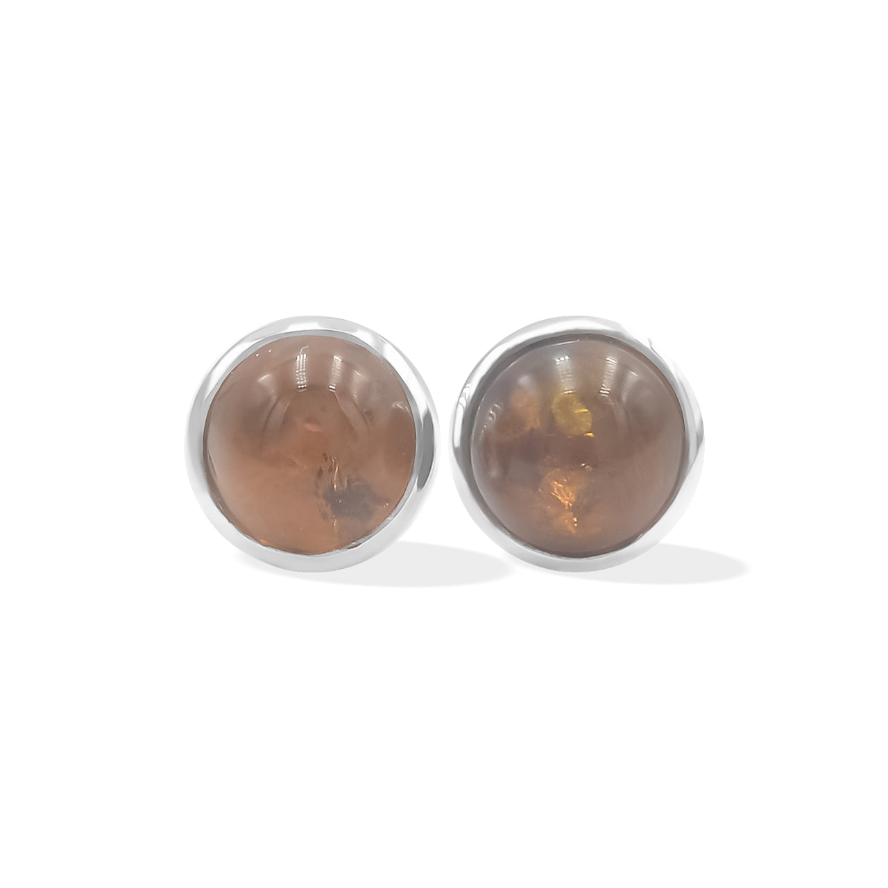 Alternate front view of a pair of silver stud earrings featuring round Baltic Amber gemstones with natural inclusions.