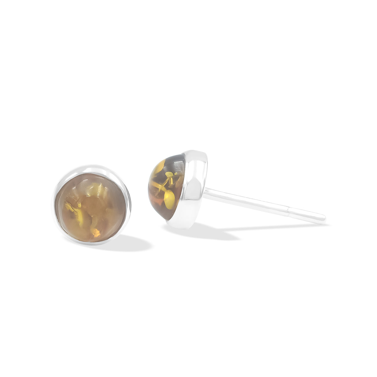 Angled view of the silver stud earrings displaying the round Baltic amber gemstones, the thickness of the setting, and the earring posts.