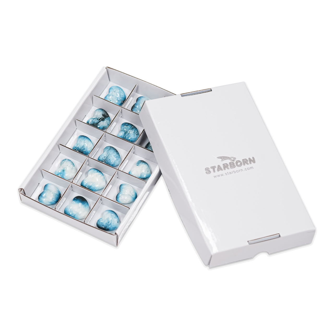 Front‑view image of the heart‑shaped Blue Ice Glacierite stones displayed in the sectioned box with the fitted lid placed beside the tray.