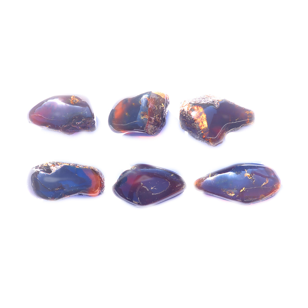Front view of six polished Sumatra Blue Amber collector pieces arranged in a row.