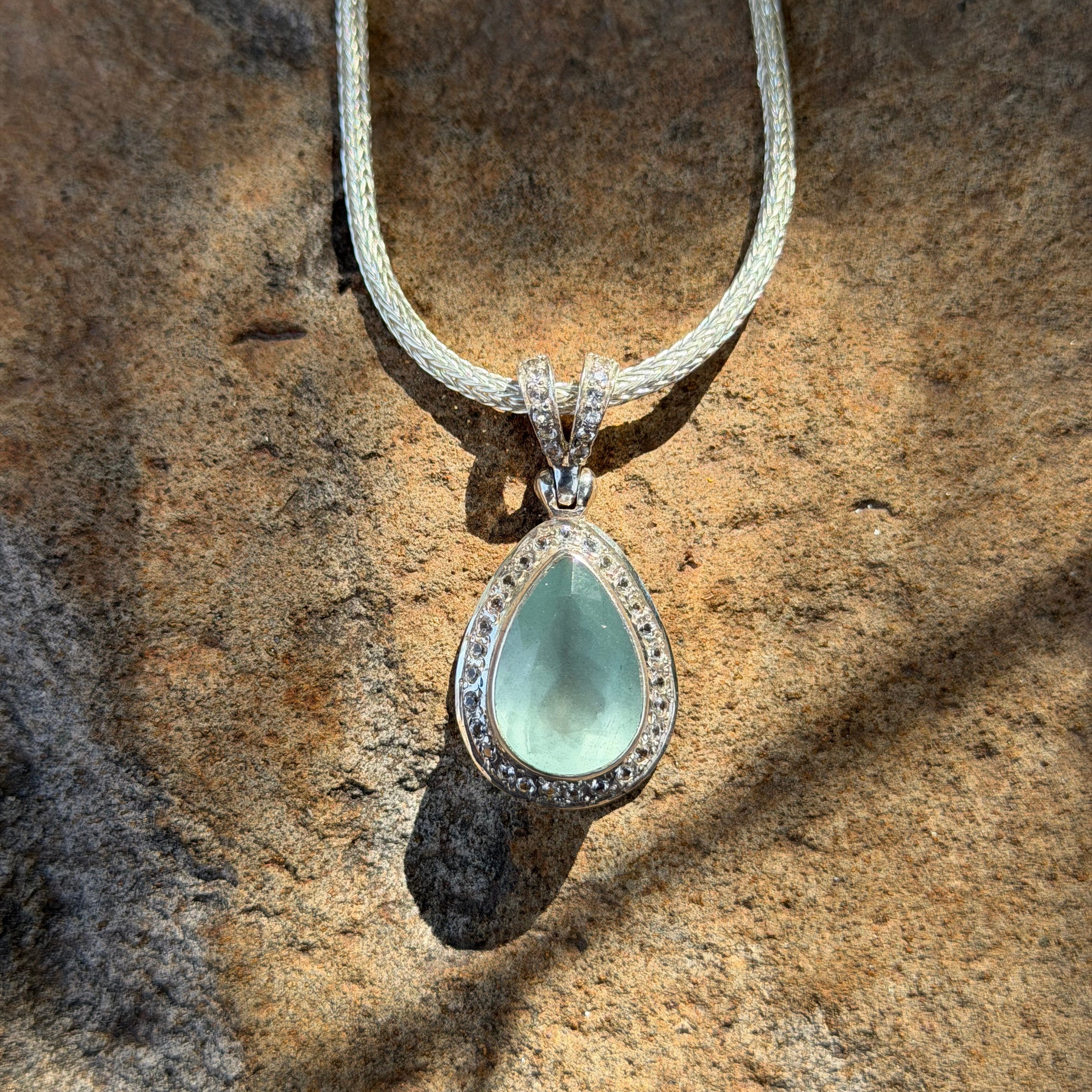 Starborn Aquamarine Pendant with Whie Topaz Pave Halo in Sterling Silver