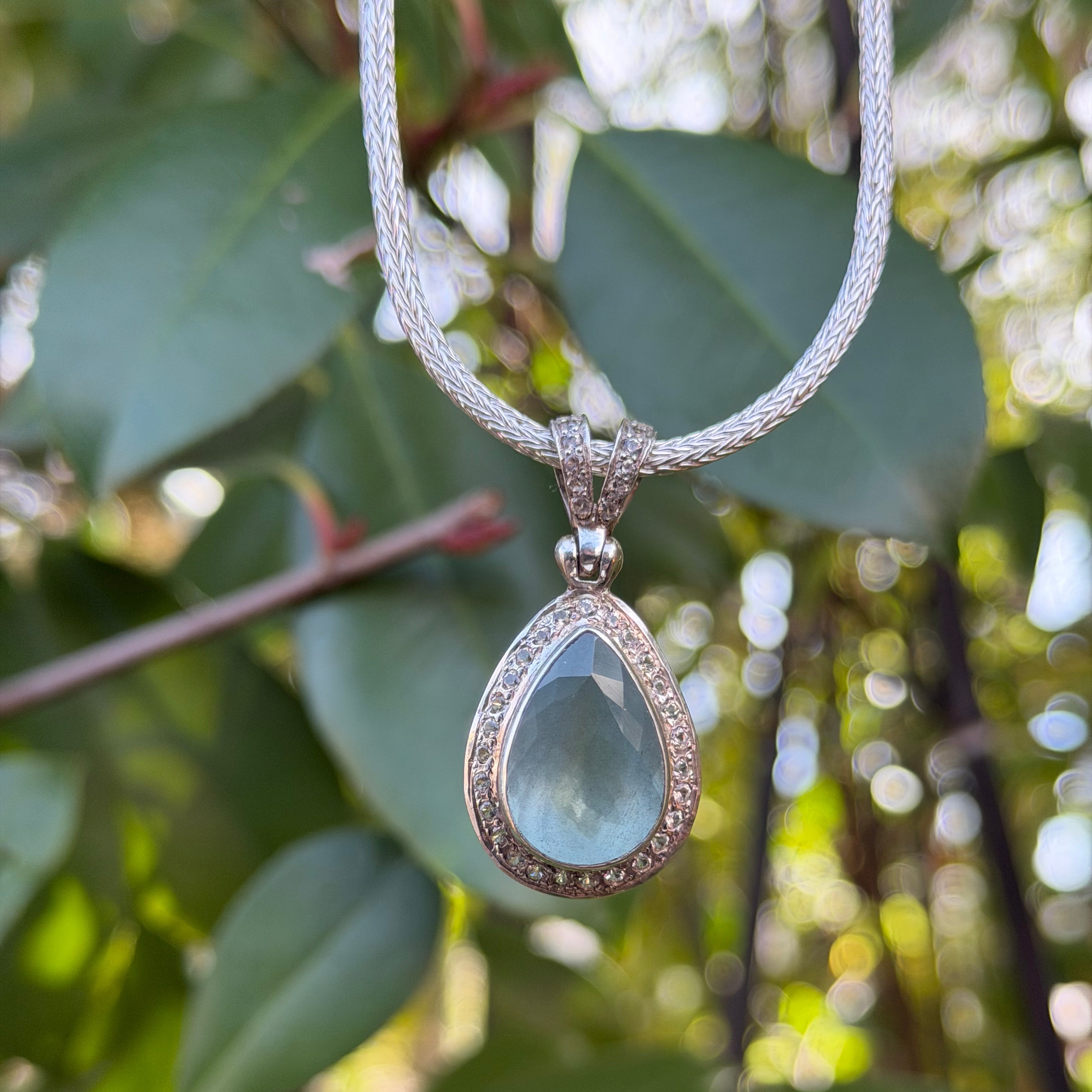 Starborn Aquamarine Pendant with Whie Topaz Pave Halo in Sterling Silver