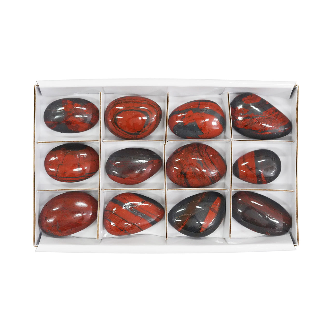 Alternate front view of twelve Ancestralite freeform palm stones showing the natural red and dark gray patterns