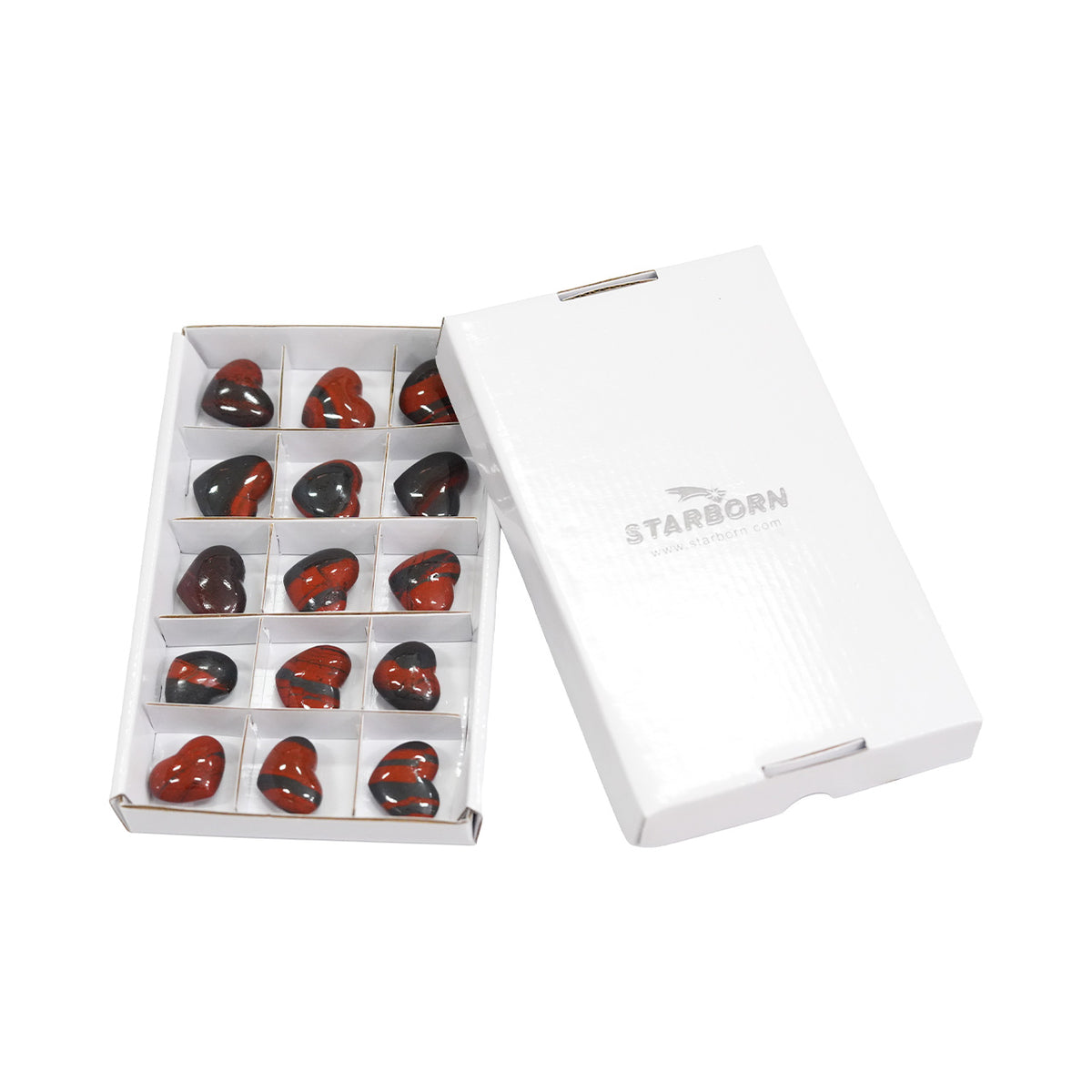 Angled view of fifteen Ancestralite heart stones shown with the protective storage box. 