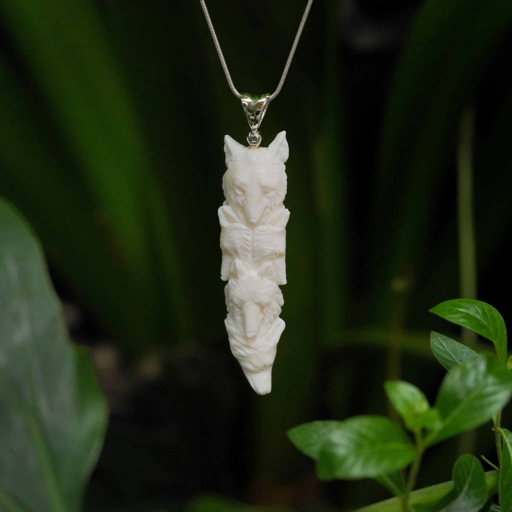 Starborn Carved Buffalo Bone Pendant Five Wolves in Sterling Silver