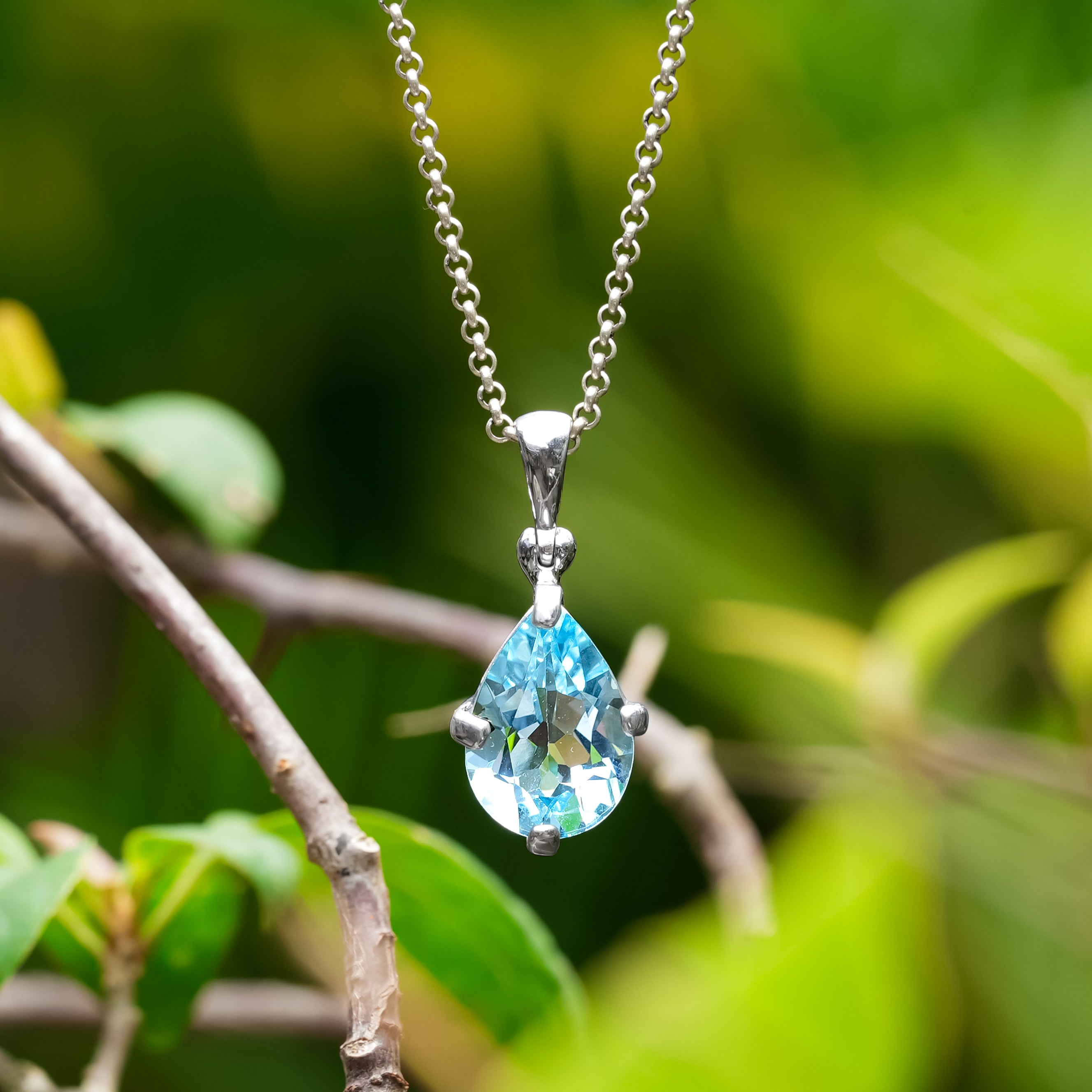 Starborn Blue Topaz Pear-Shape Pendant in Fine Sterling Silver